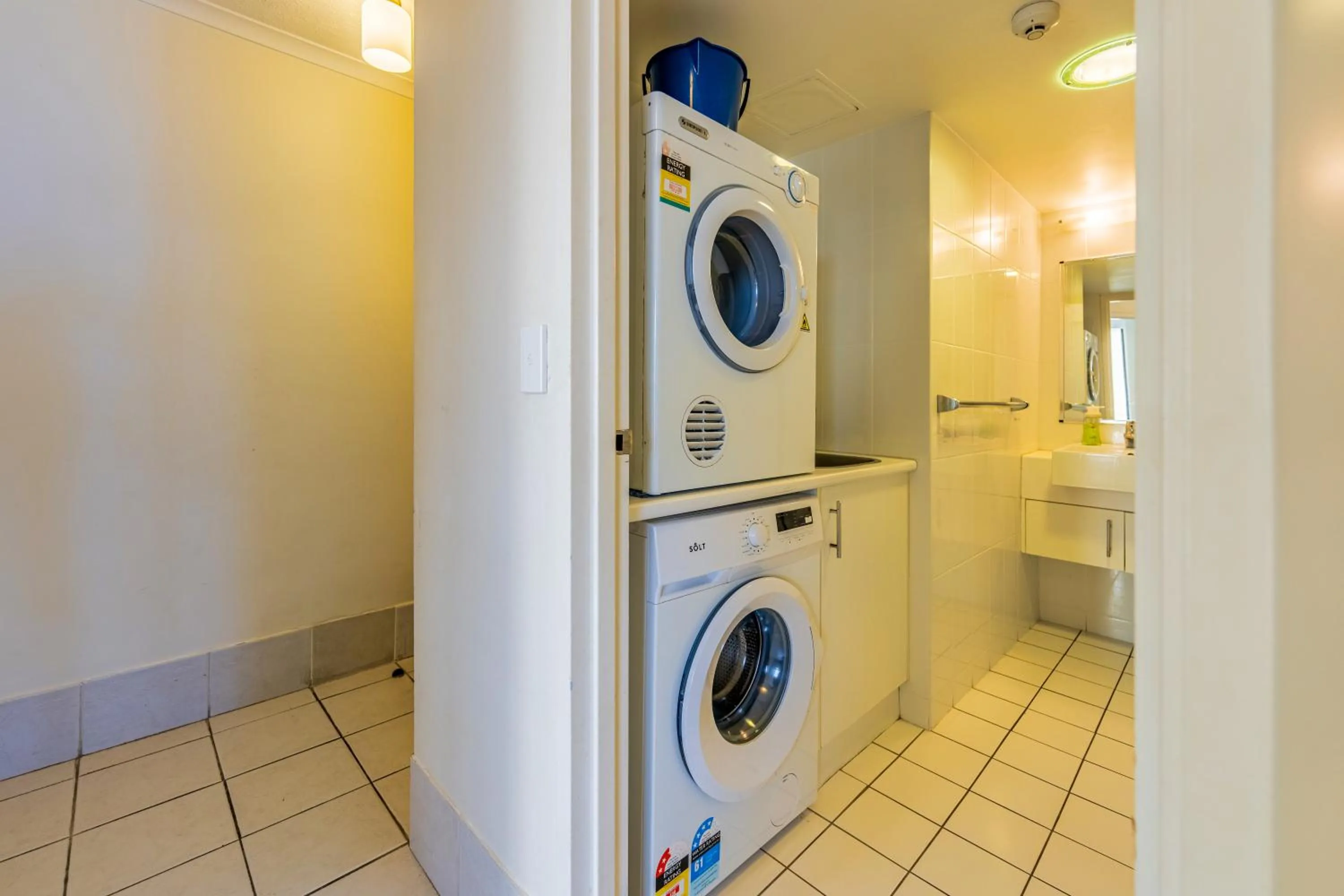 laundry in Olympus Beachfront Apartments
