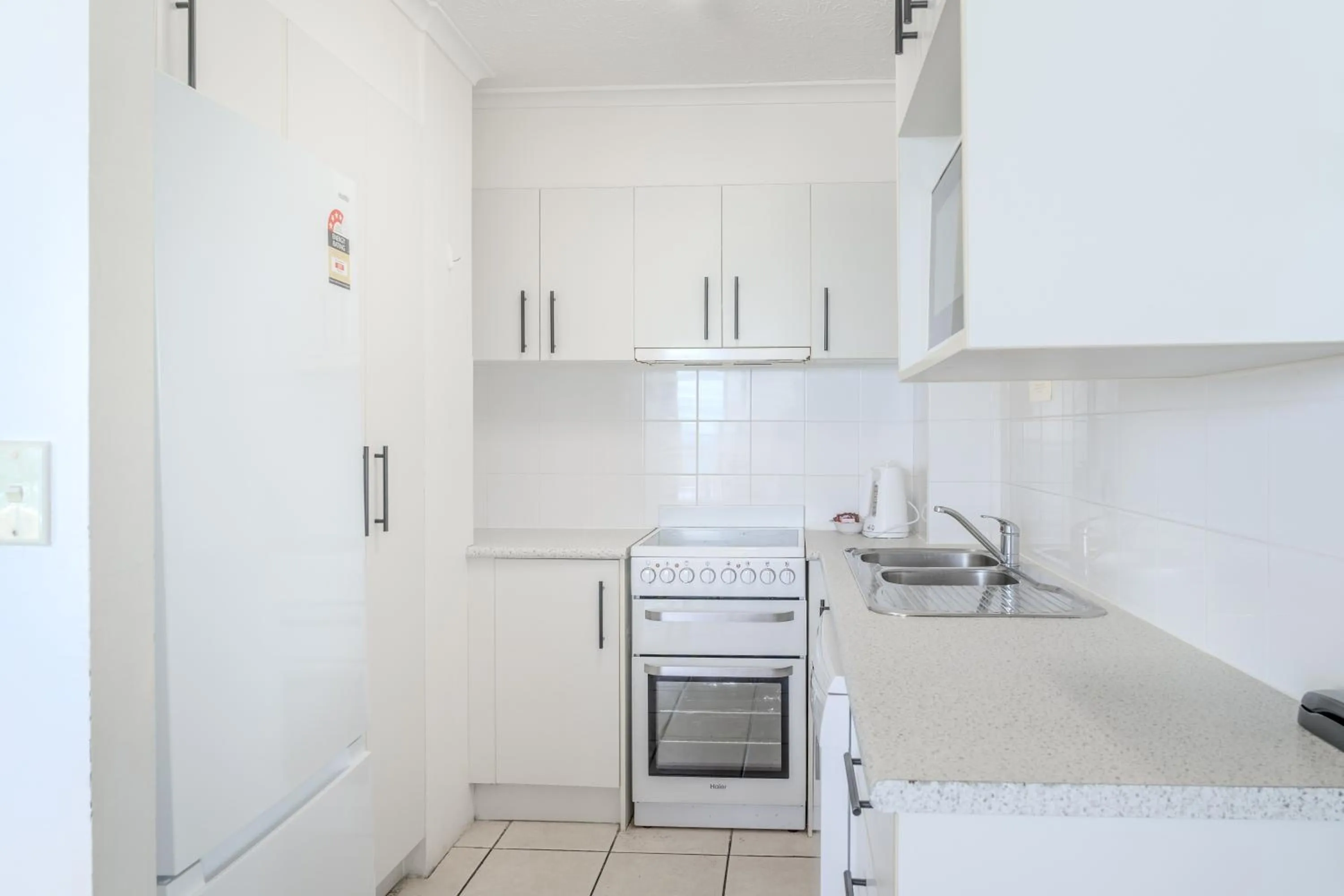 kitchen in Olympus Beachfront Apartments