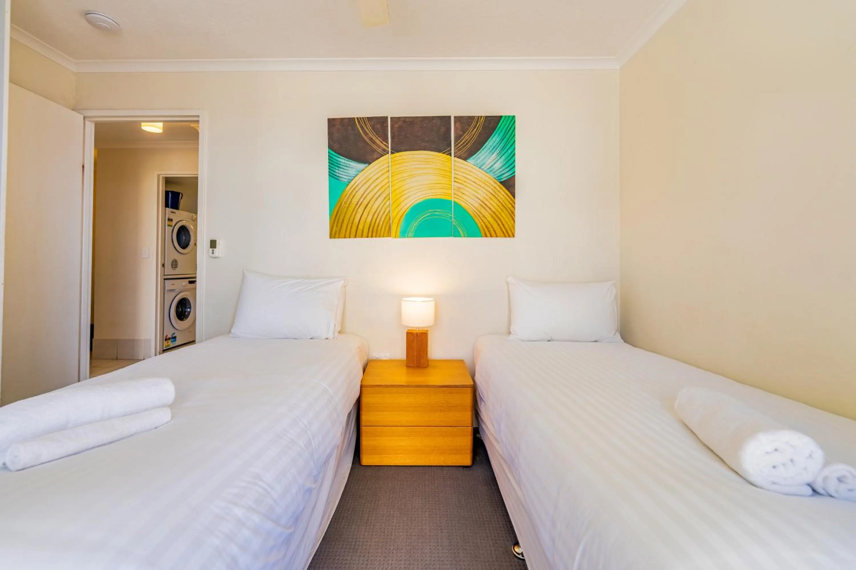 Bedroom, Bed in Olympus Beachfront Apartments