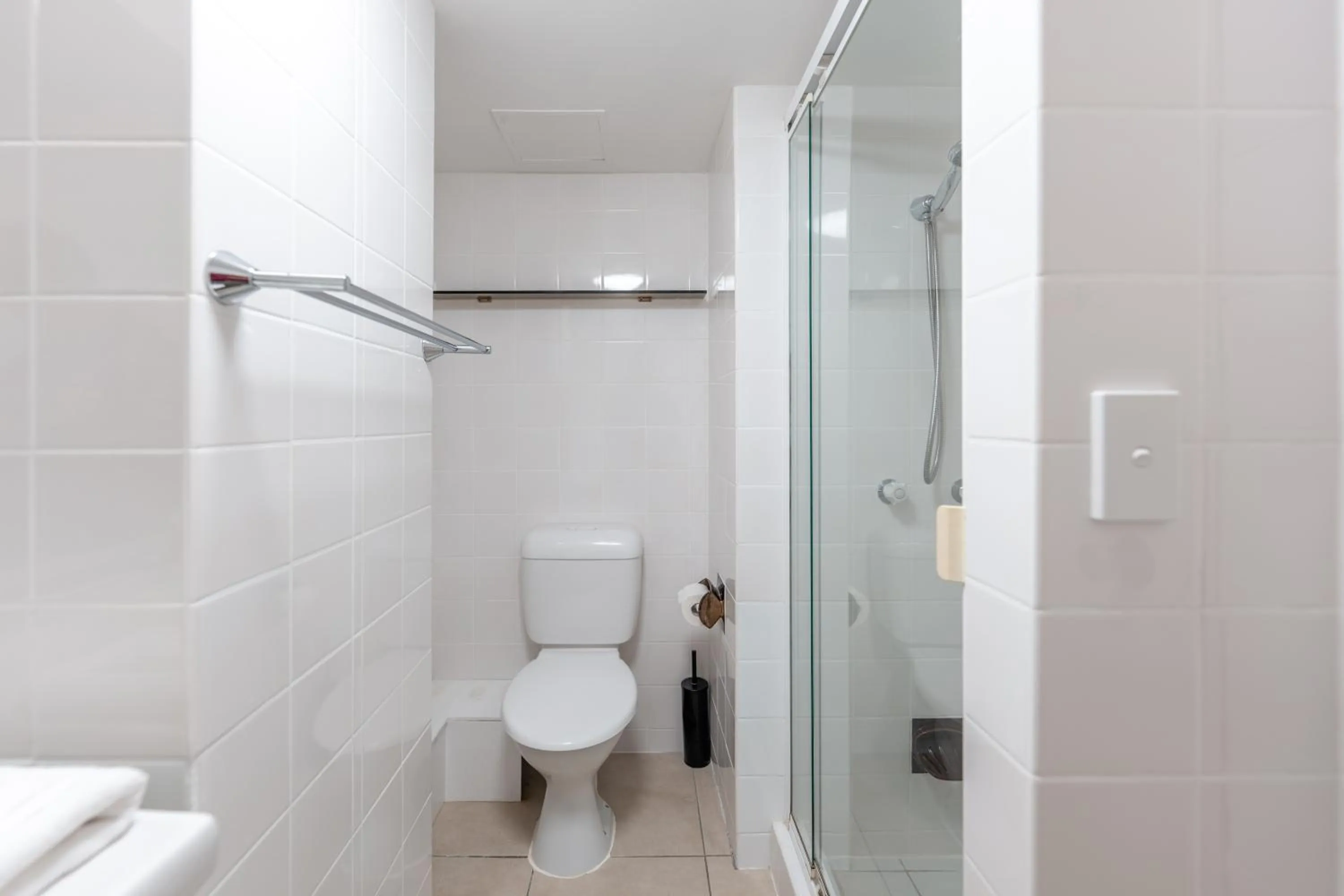 Bathroom in Olympus Beachfront Apartments
