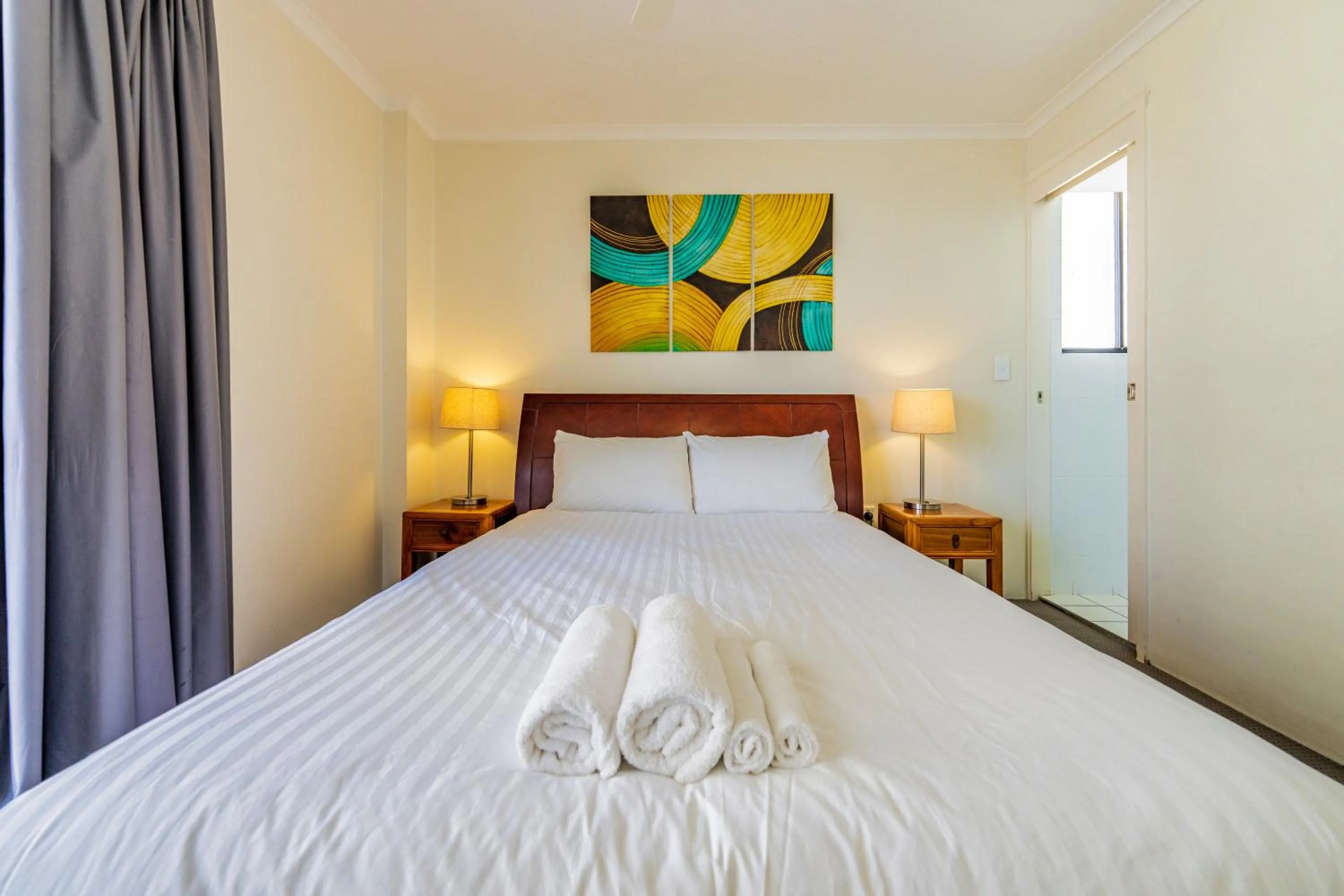 Bedroom, Bed in Olympus Beachfront Apartments