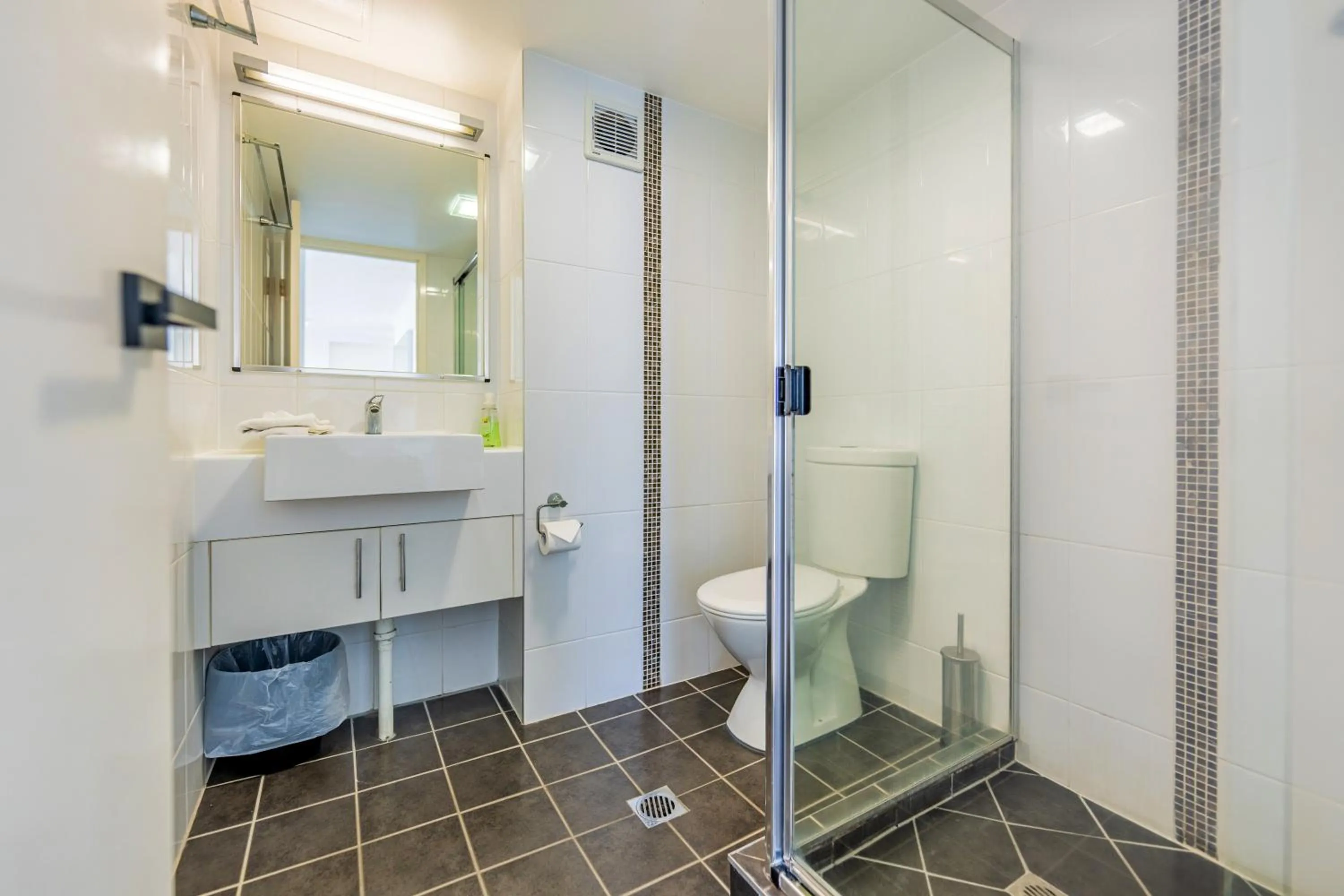 Bathroom in Olympus Beachfront Apartments