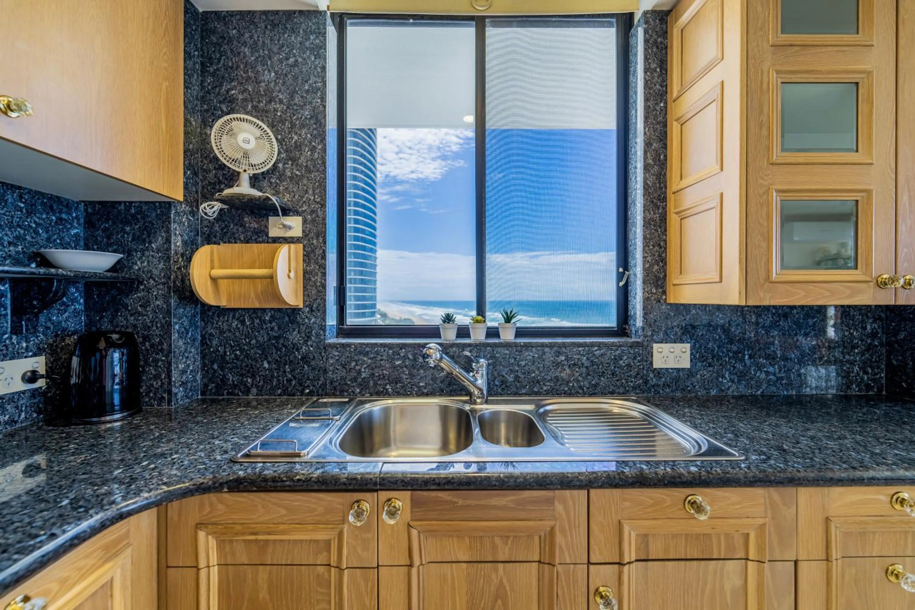 kitchen in Olympus Beachfront Apartments