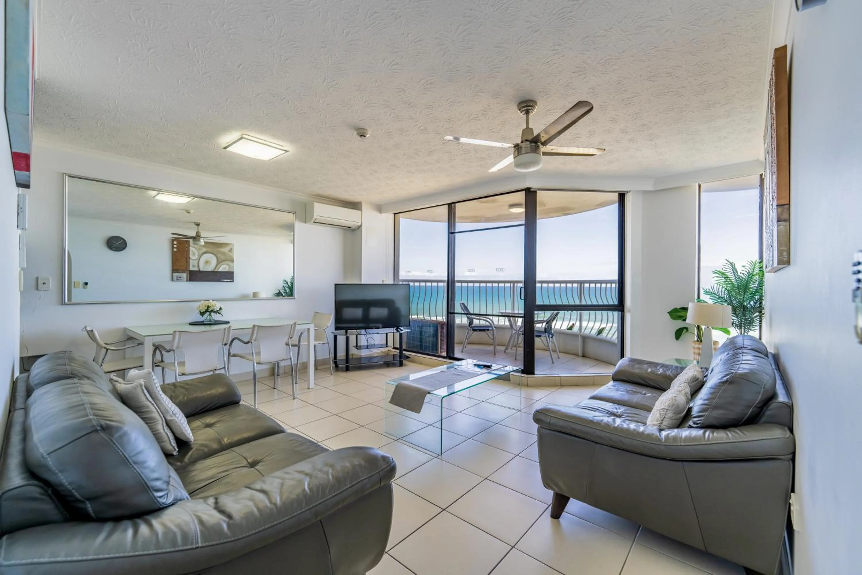 Living room in Olympus Beachfront Apartments