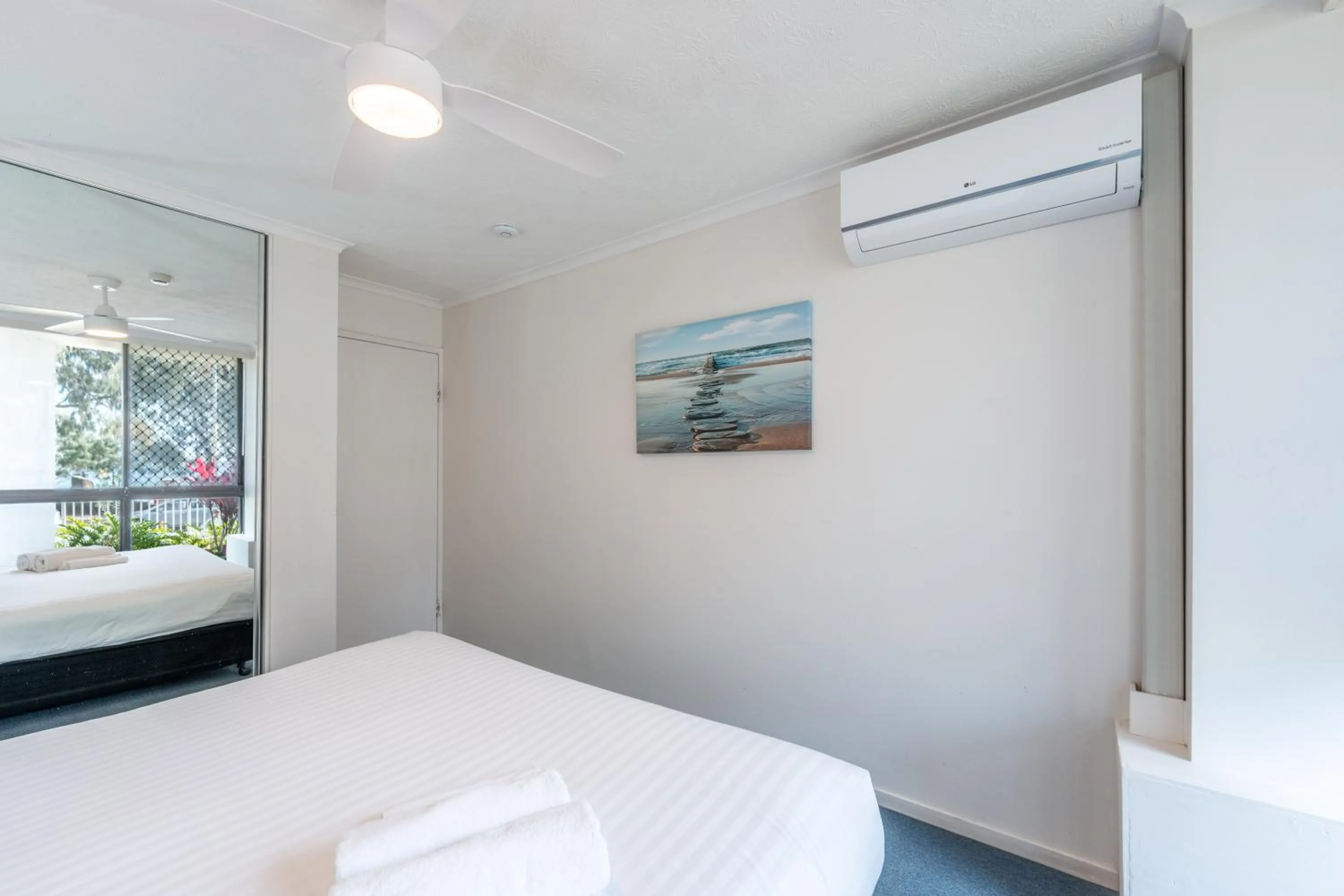 Bedroom, Bed in Olympus Beachfront Apartments