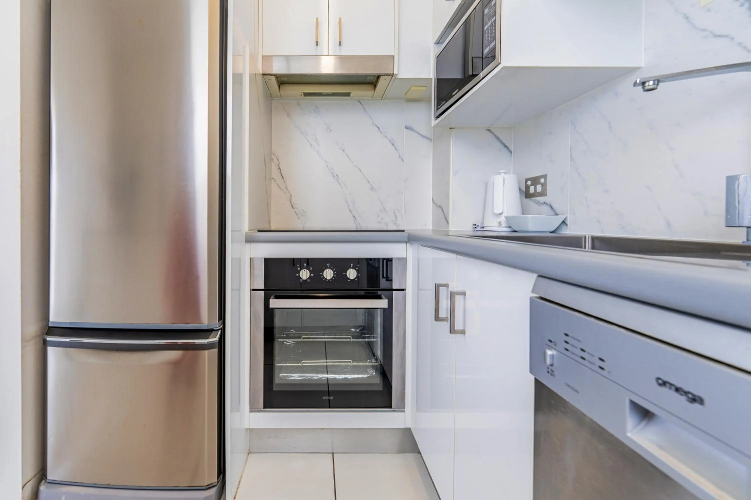 kitchen in Olympus Beachfront Apartments