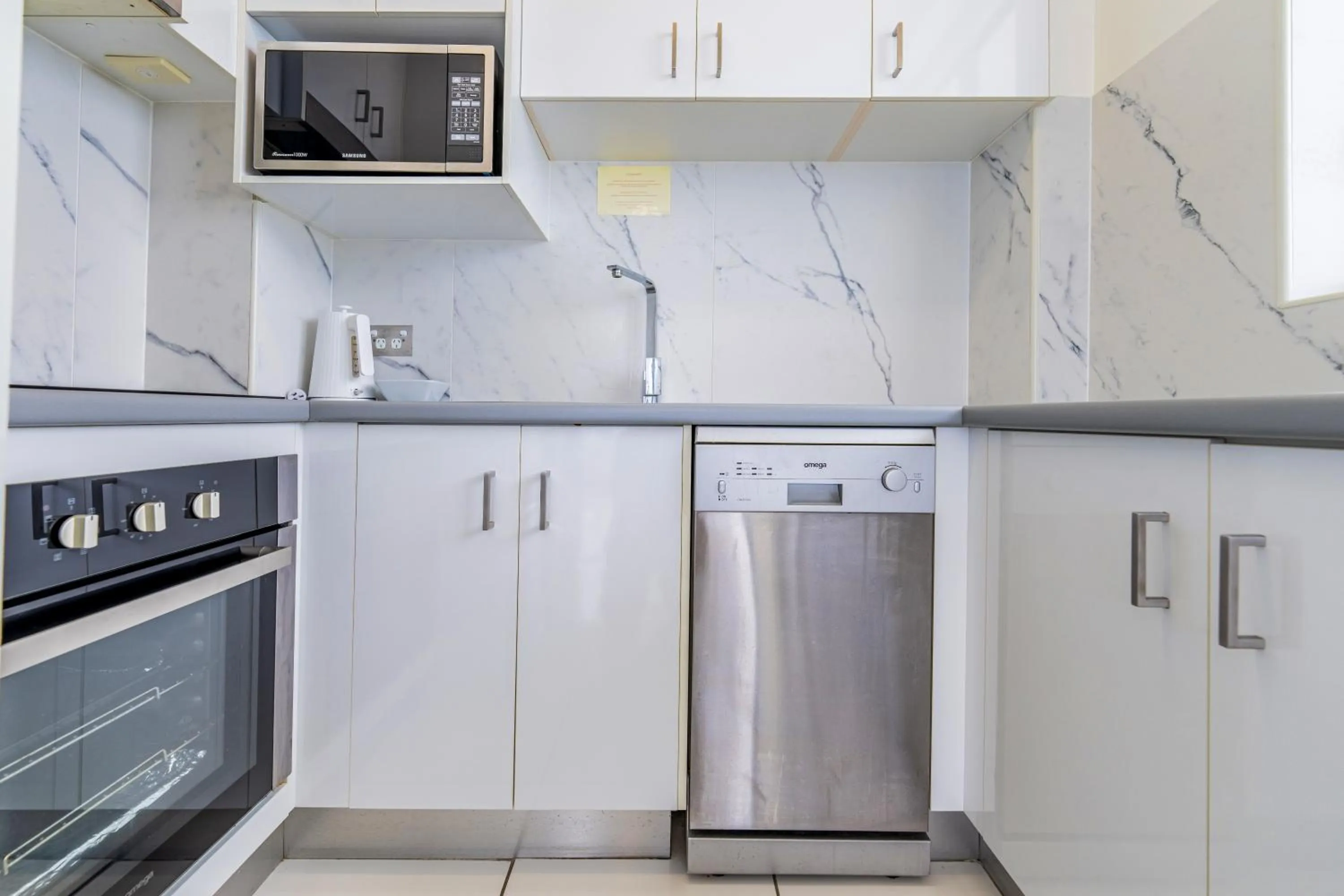 kitchen in Olympus Beachfront Apartments