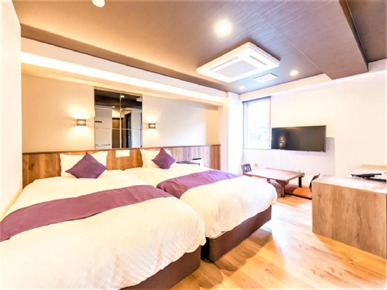 Bed in LiVEMAX RESORT Kusatsu Onsen