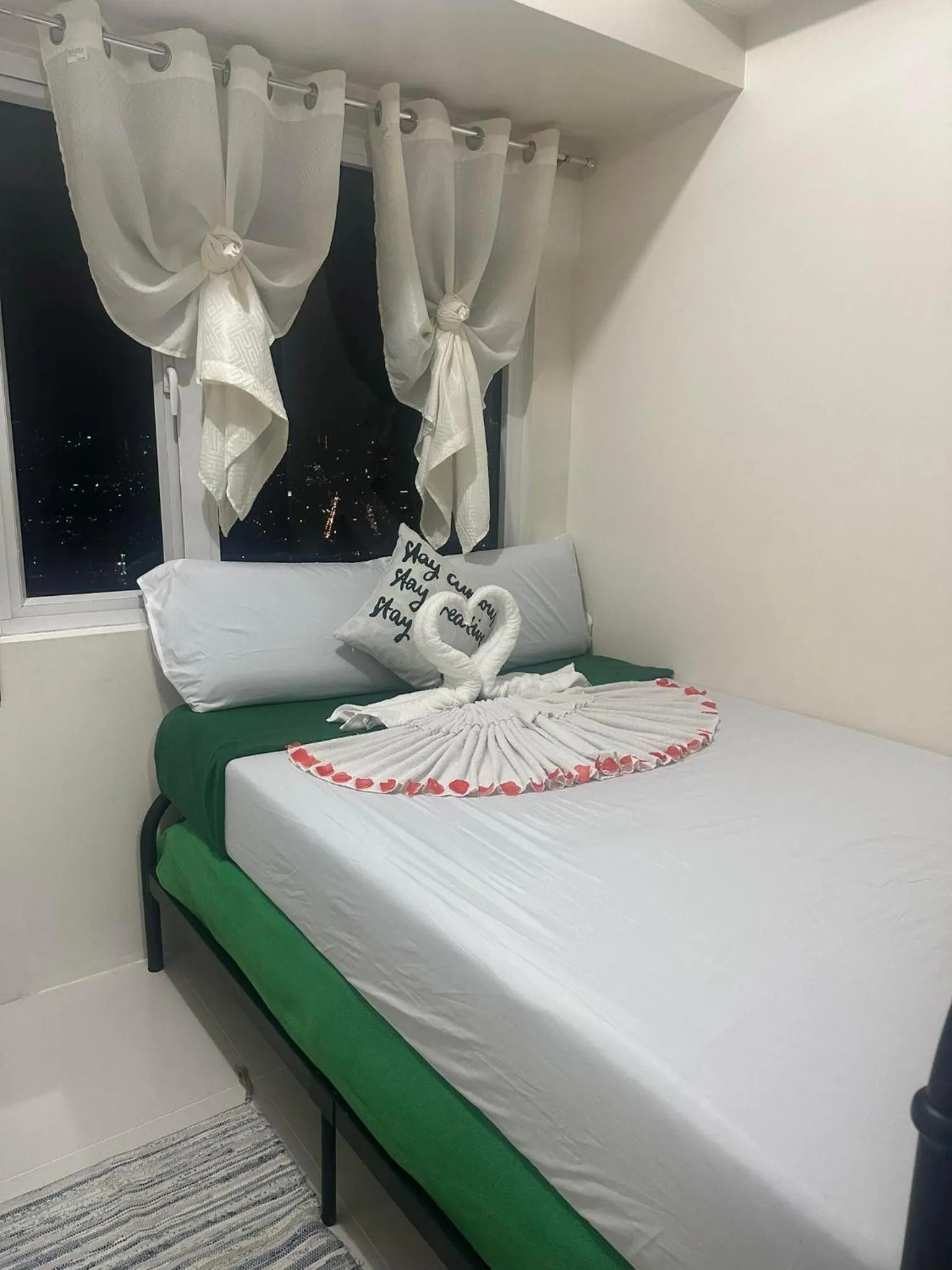 Bed in Green Residences Stays by PBYY