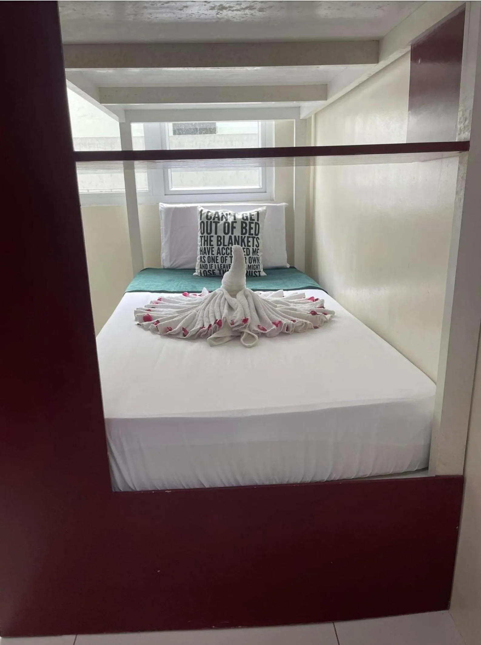 Bed in Green Residences Stays by PBYY