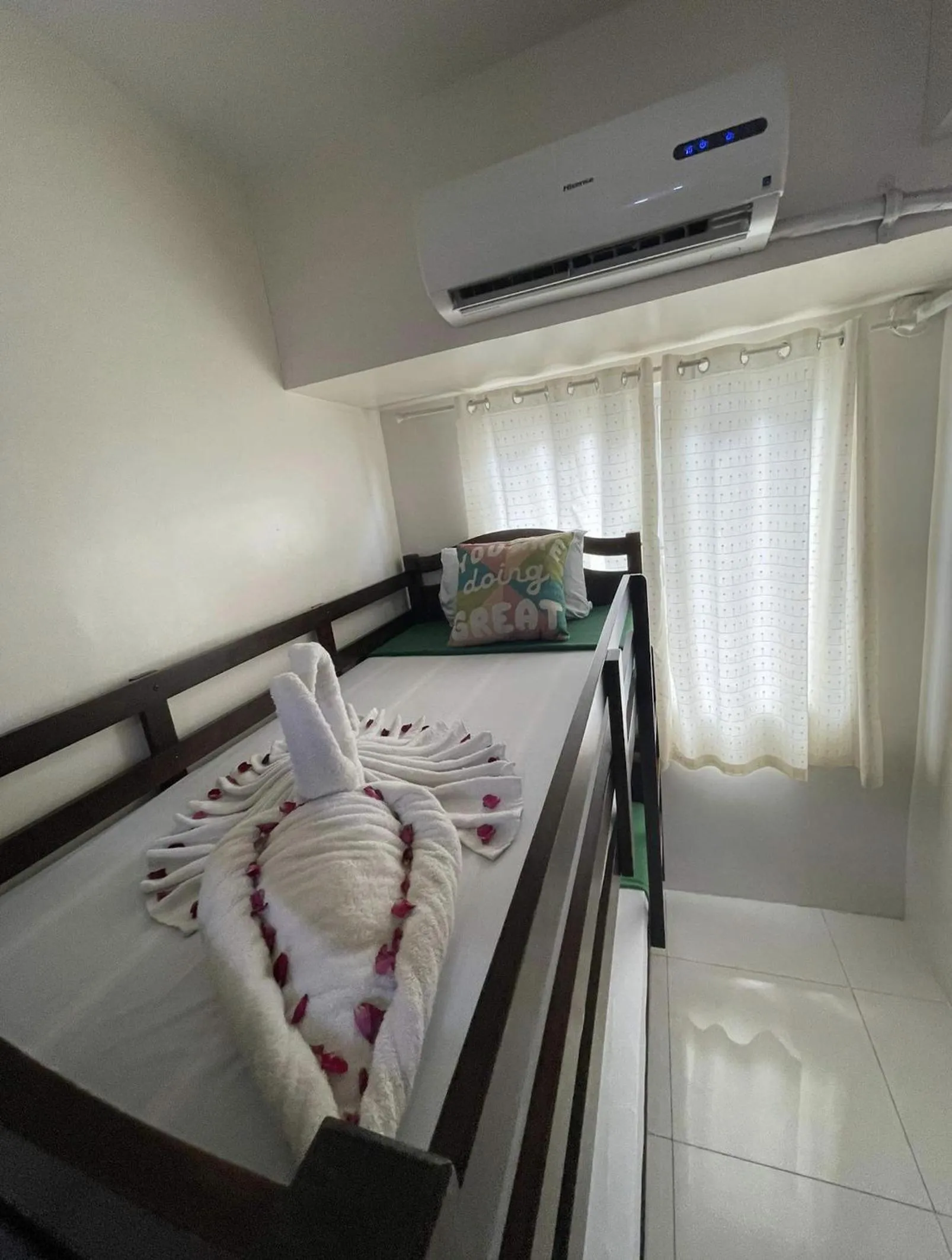Bed in Green Residences Stays by PBYY