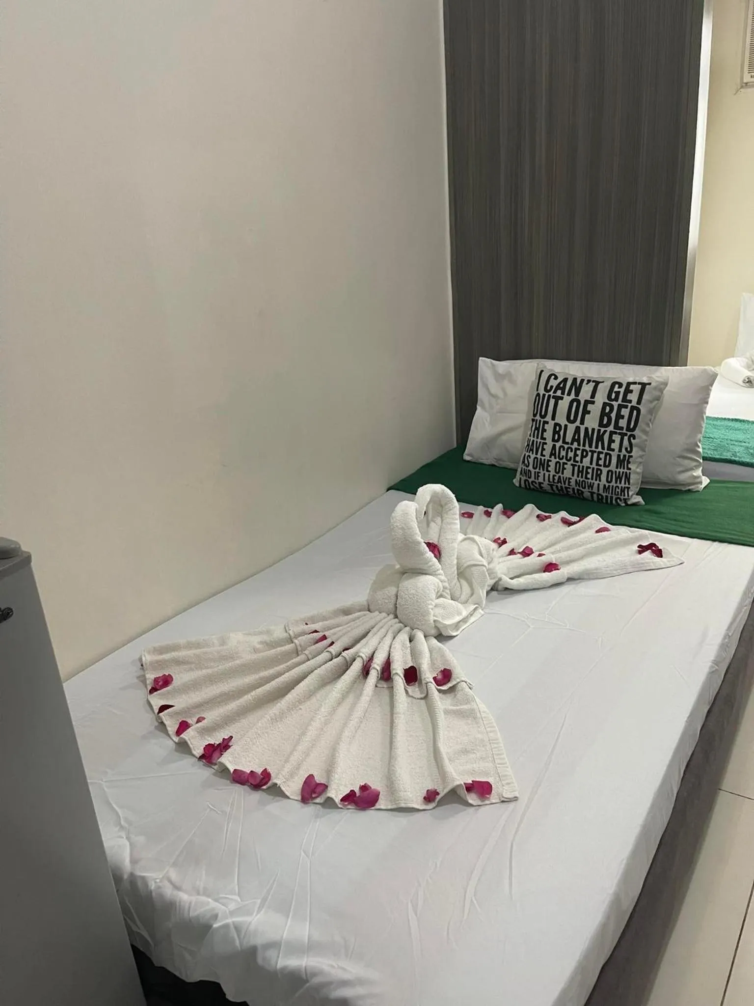 Bed in Green Residences Stays by PBYY