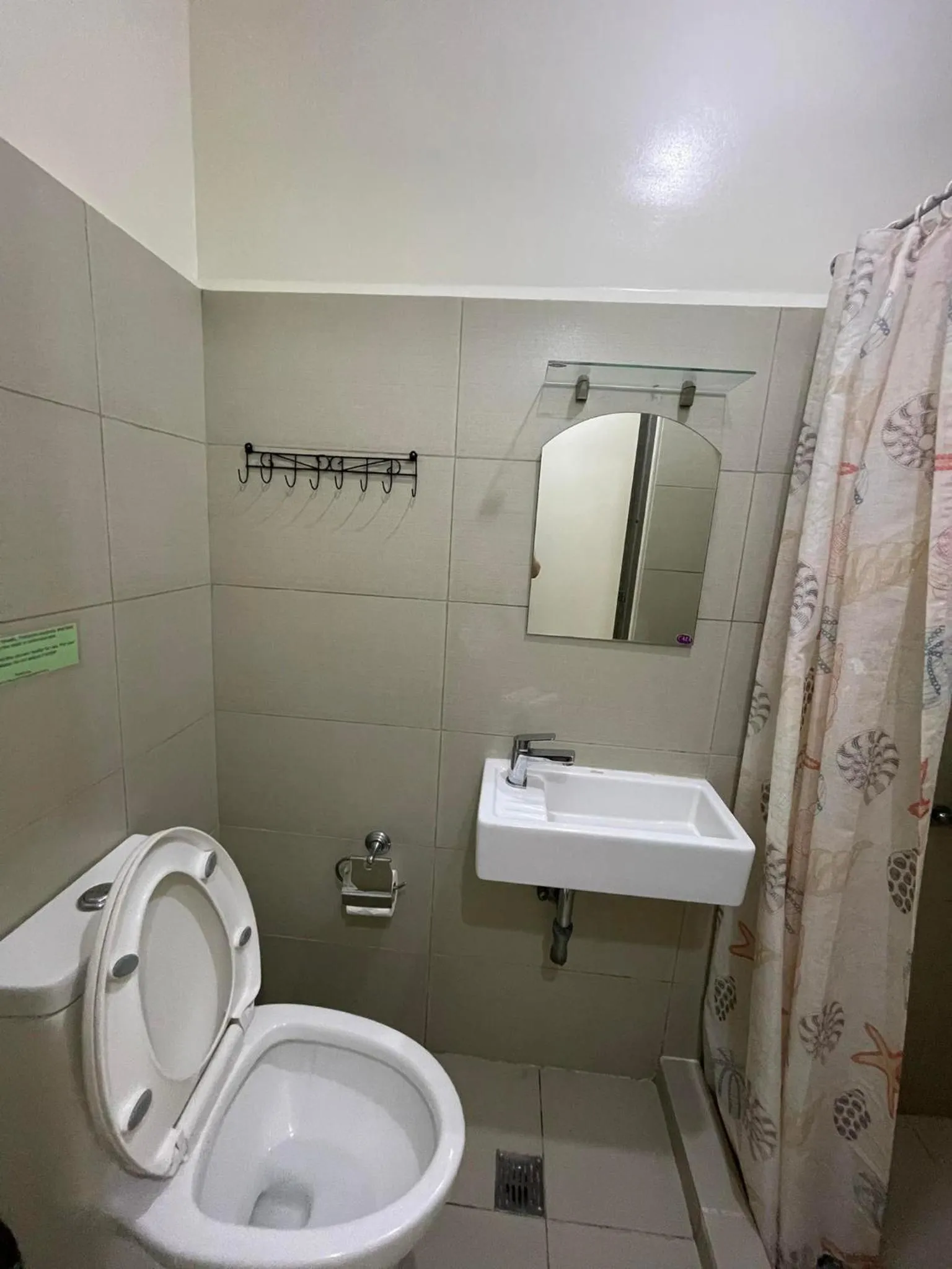 Shower in Green Residences Stays by PBYY