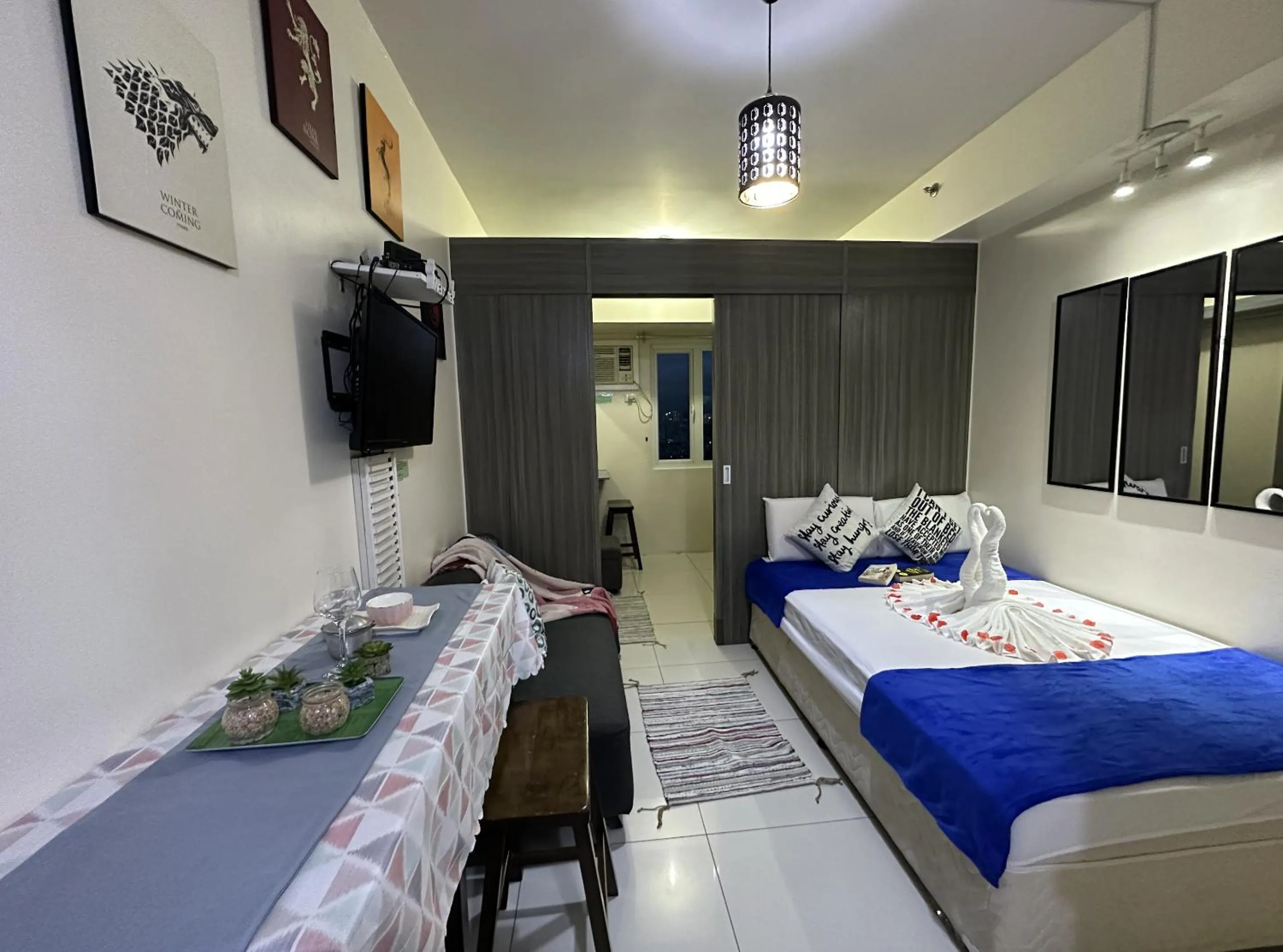 Bed in Green Residences Stays by PBYY