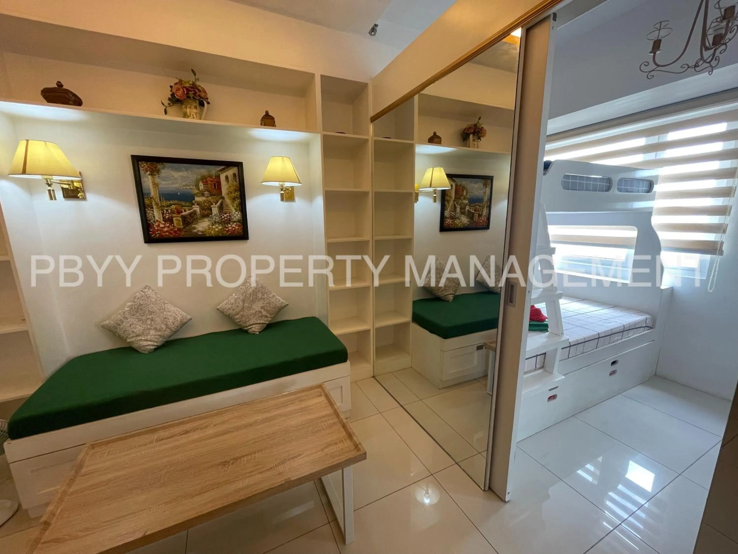 Bed in Green Residences Stays by PBYY