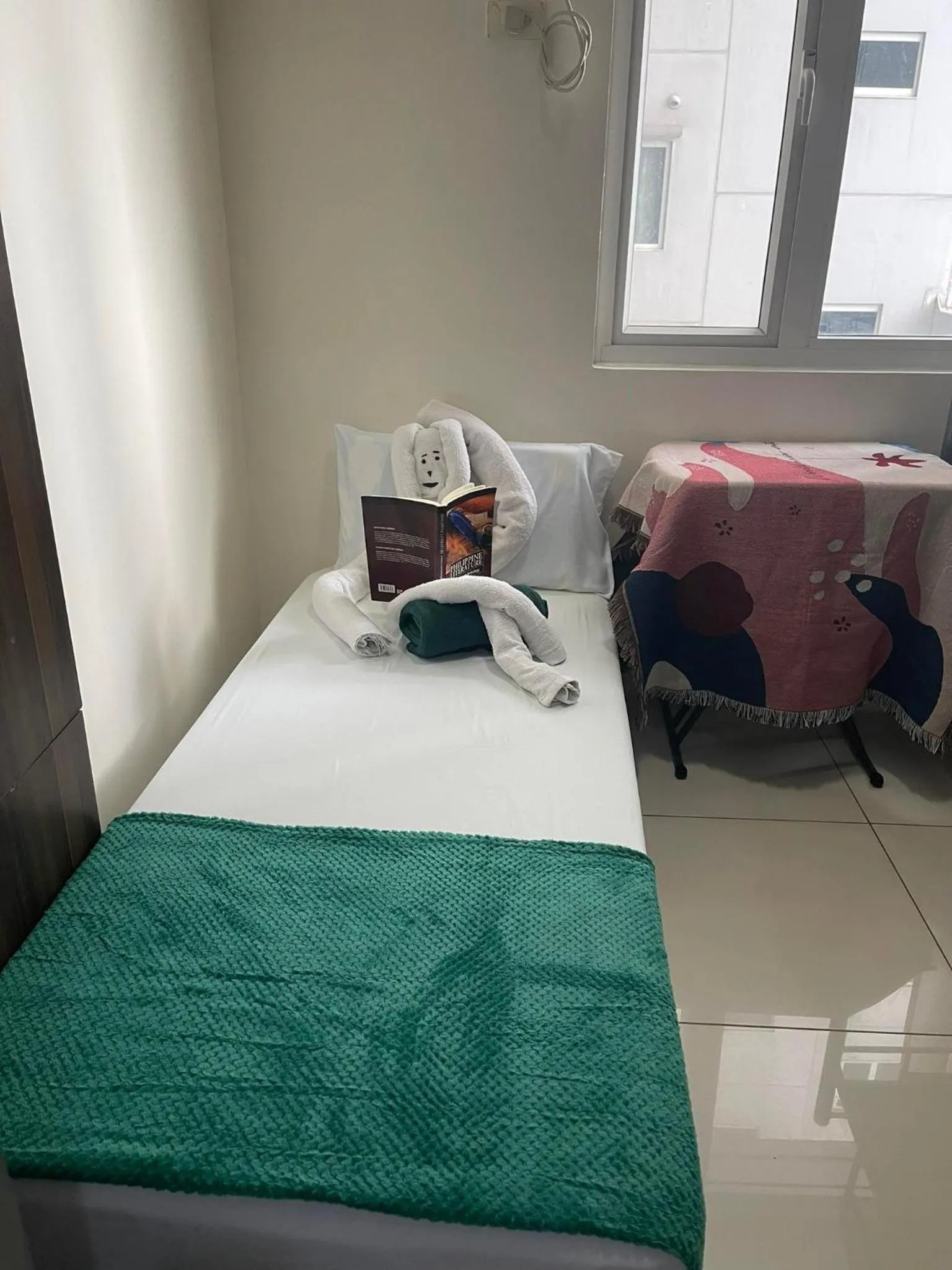 Bed in Green Residences Stays by PBYY