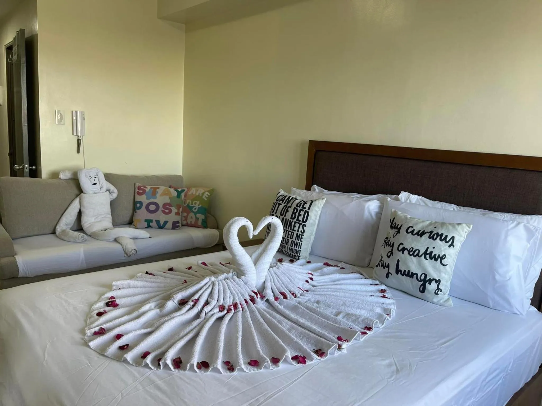 Bed in Green Residences Stays by PBYY