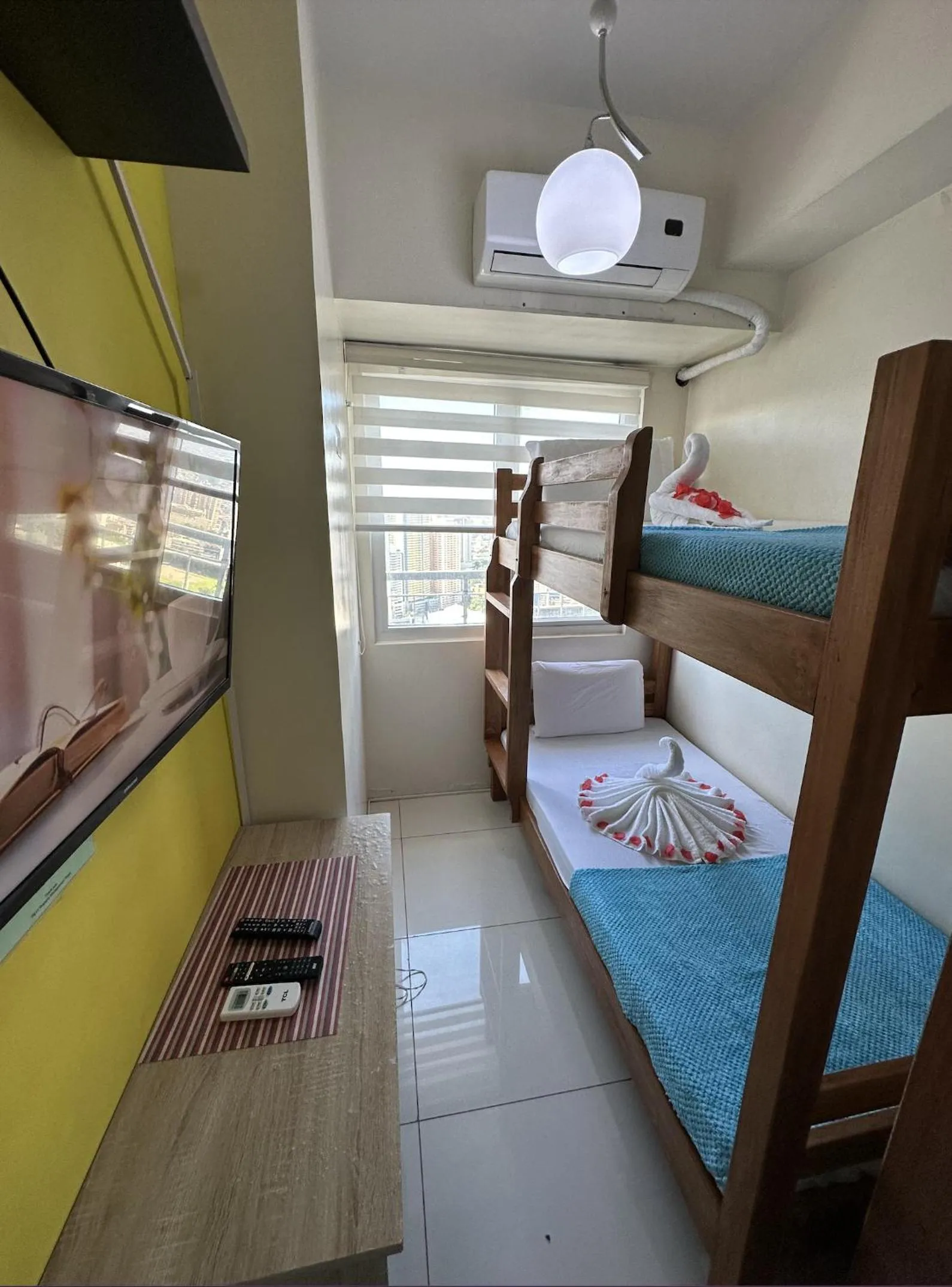 TV and multimedia, Bed in Green Residences Stays by PBYY