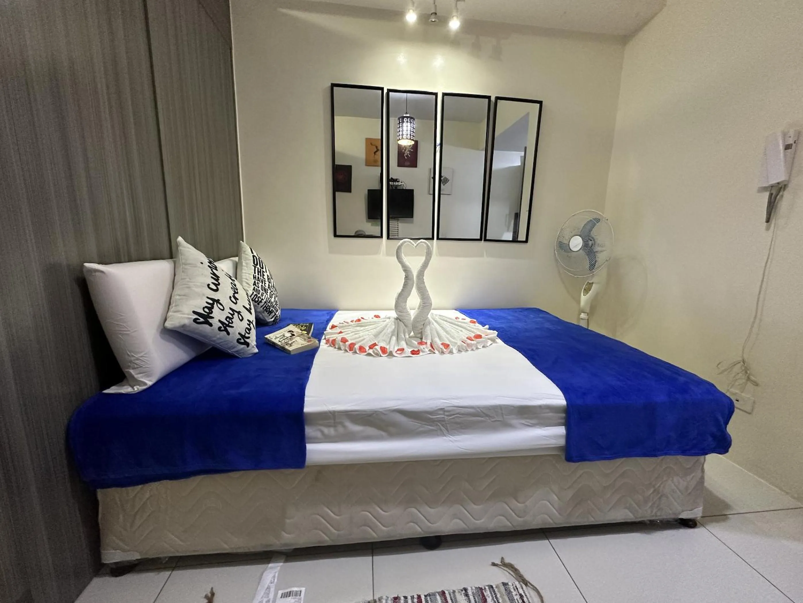 Bed in Green Residences Stays by PBYY