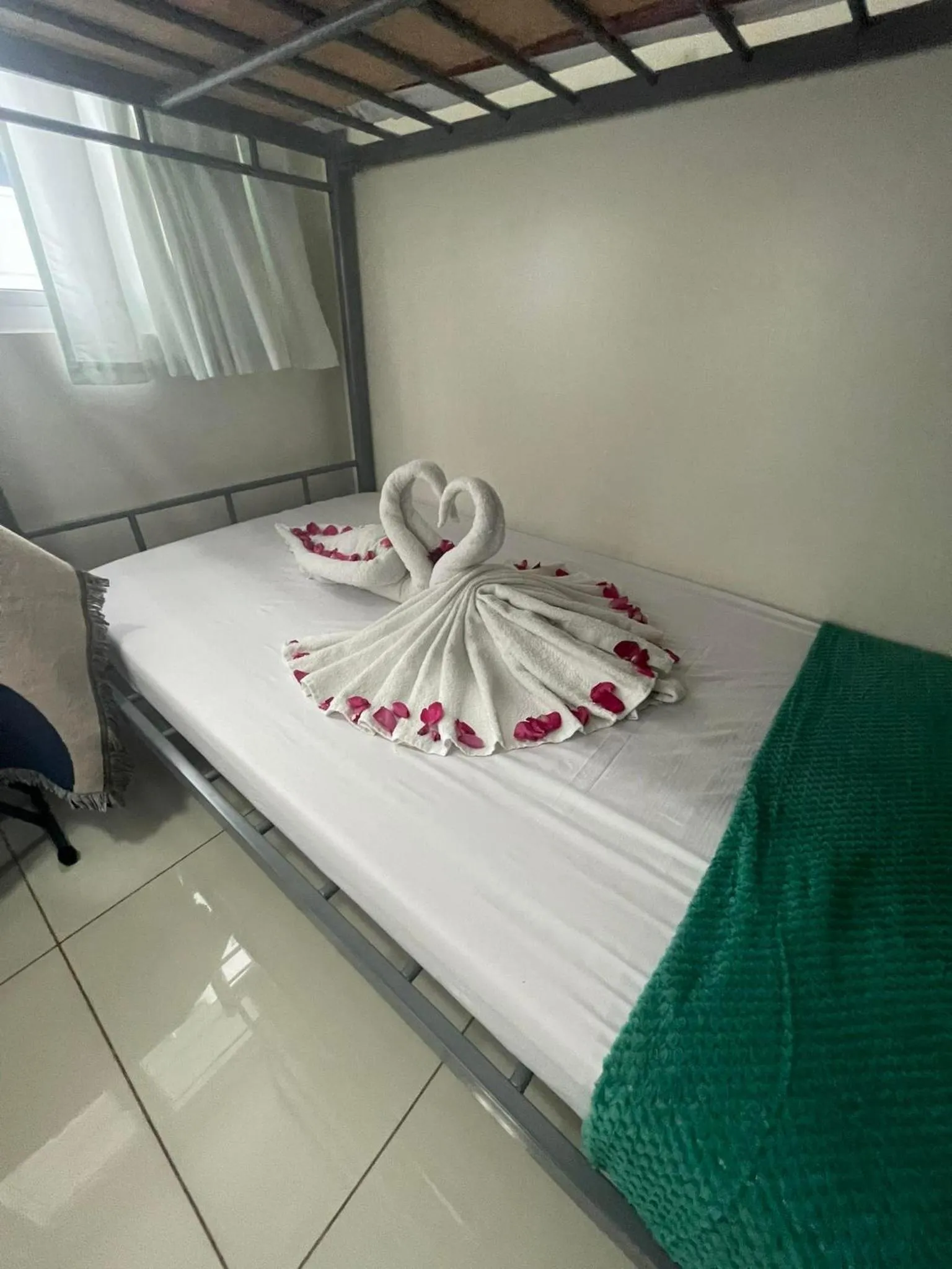 Bed in Green Residences Stays by PBYY