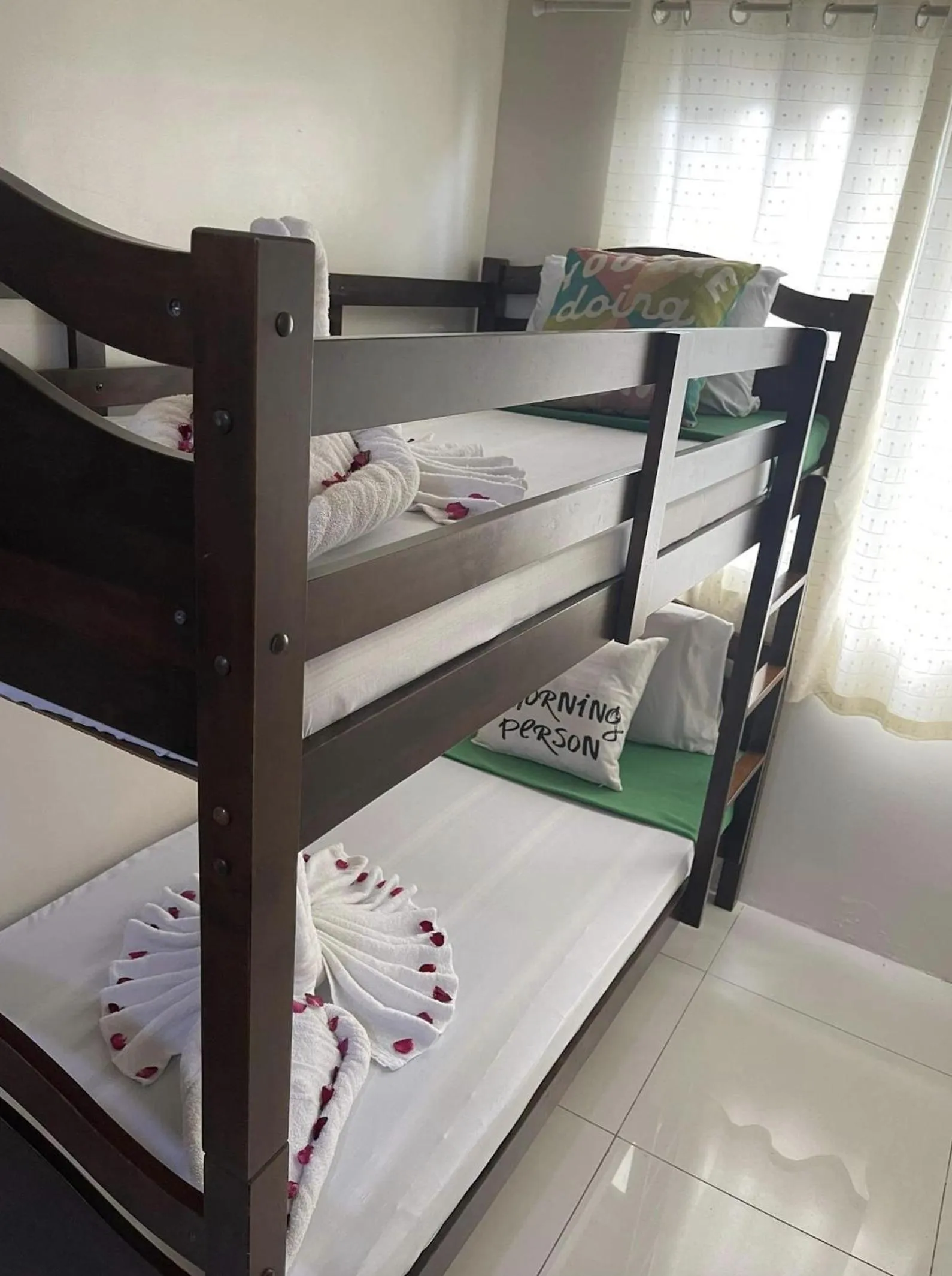 Bed in Green Residences Stays by PBYY