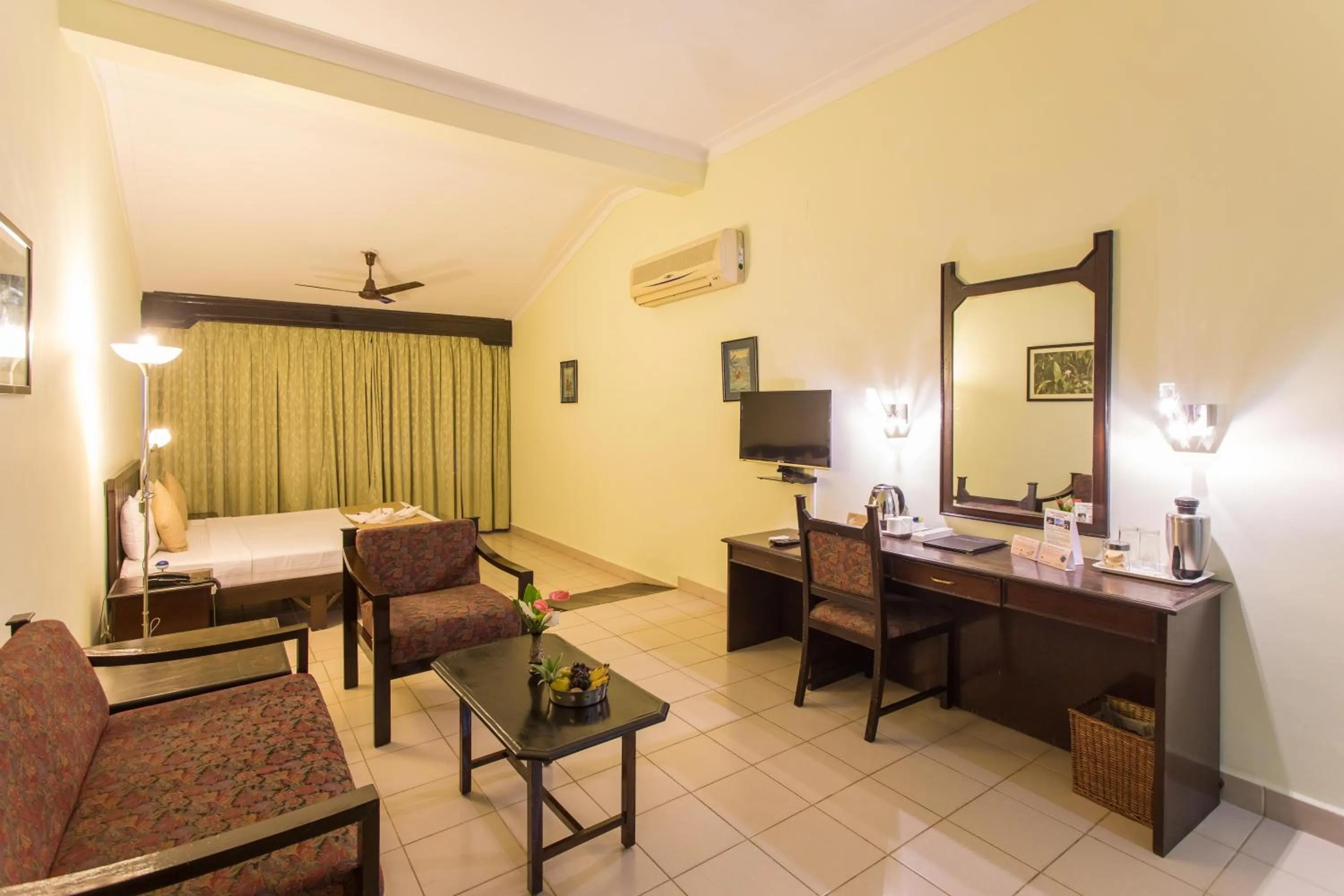 Bedroom in Hotel Coorg International