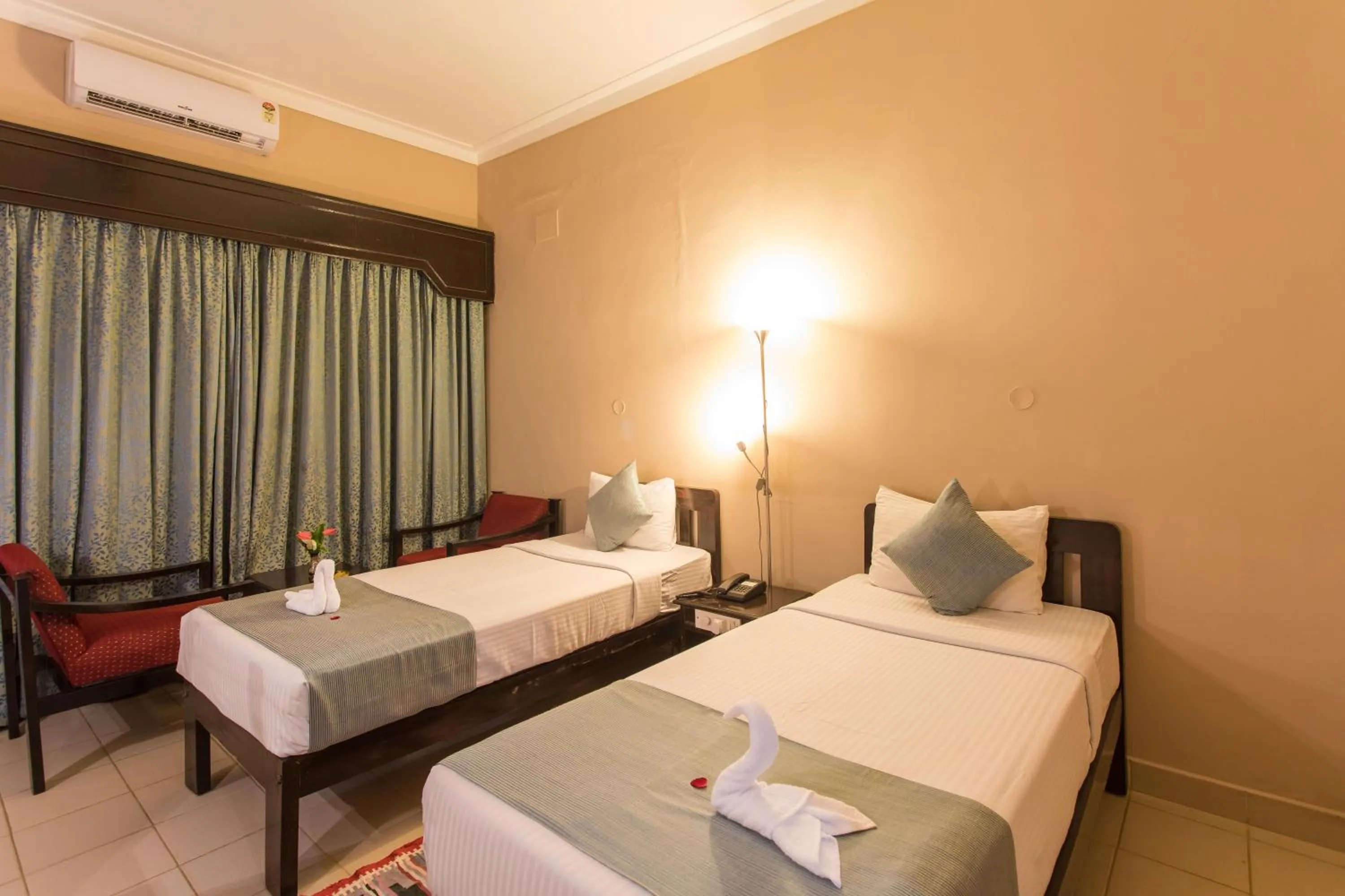 Bedroom, Bed in Hotel Coorg International