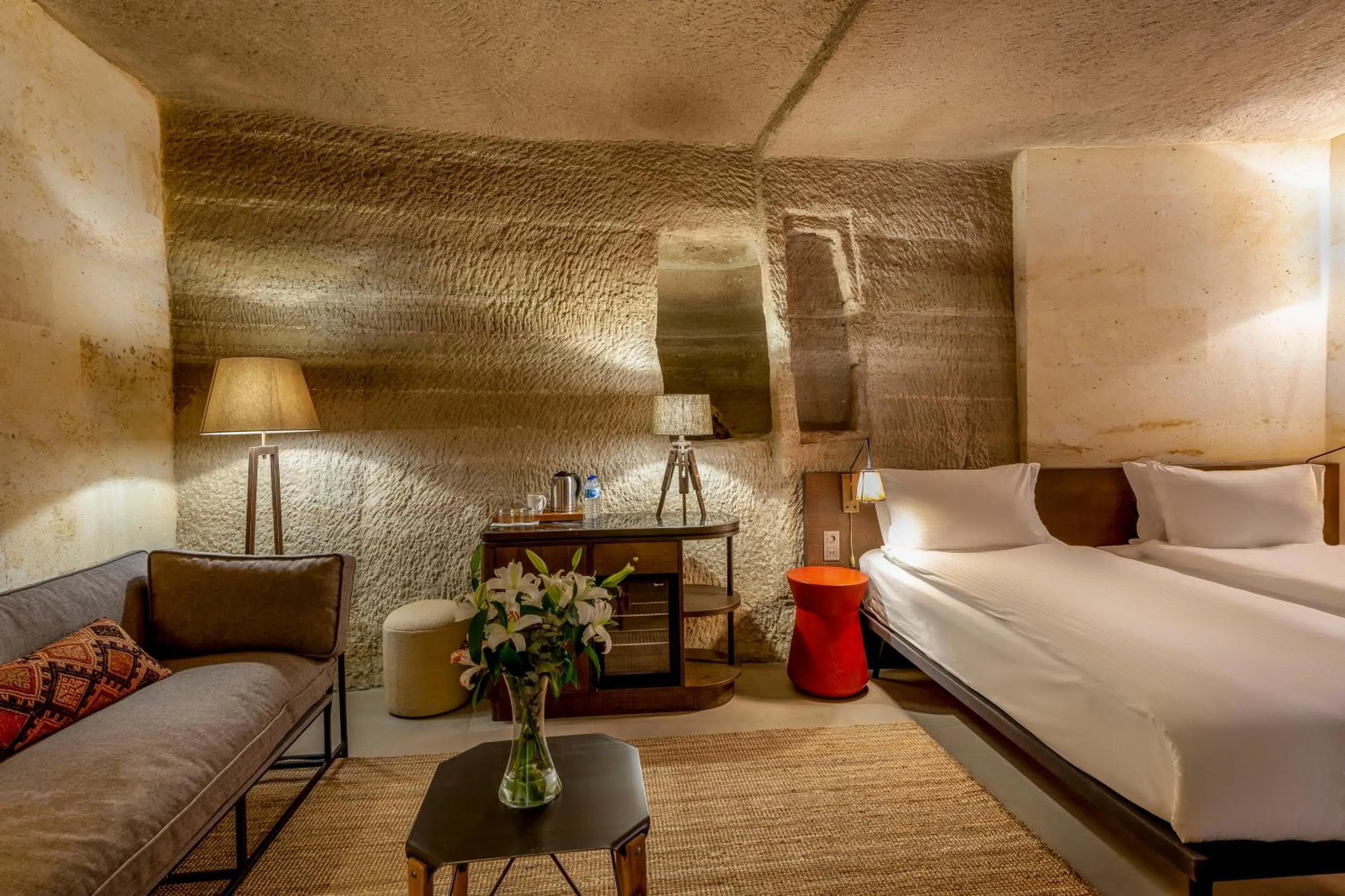 Seating area, Bed in Carus Cappadocia