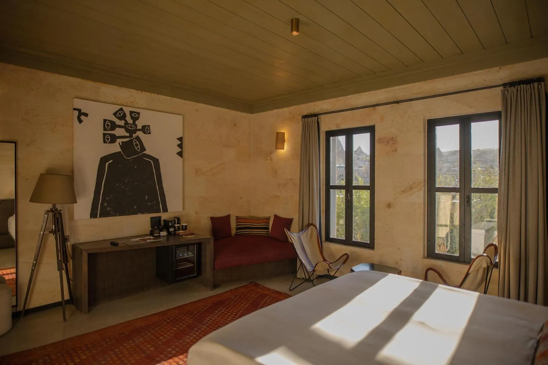Seating area, Bed in Carus Cappadocia