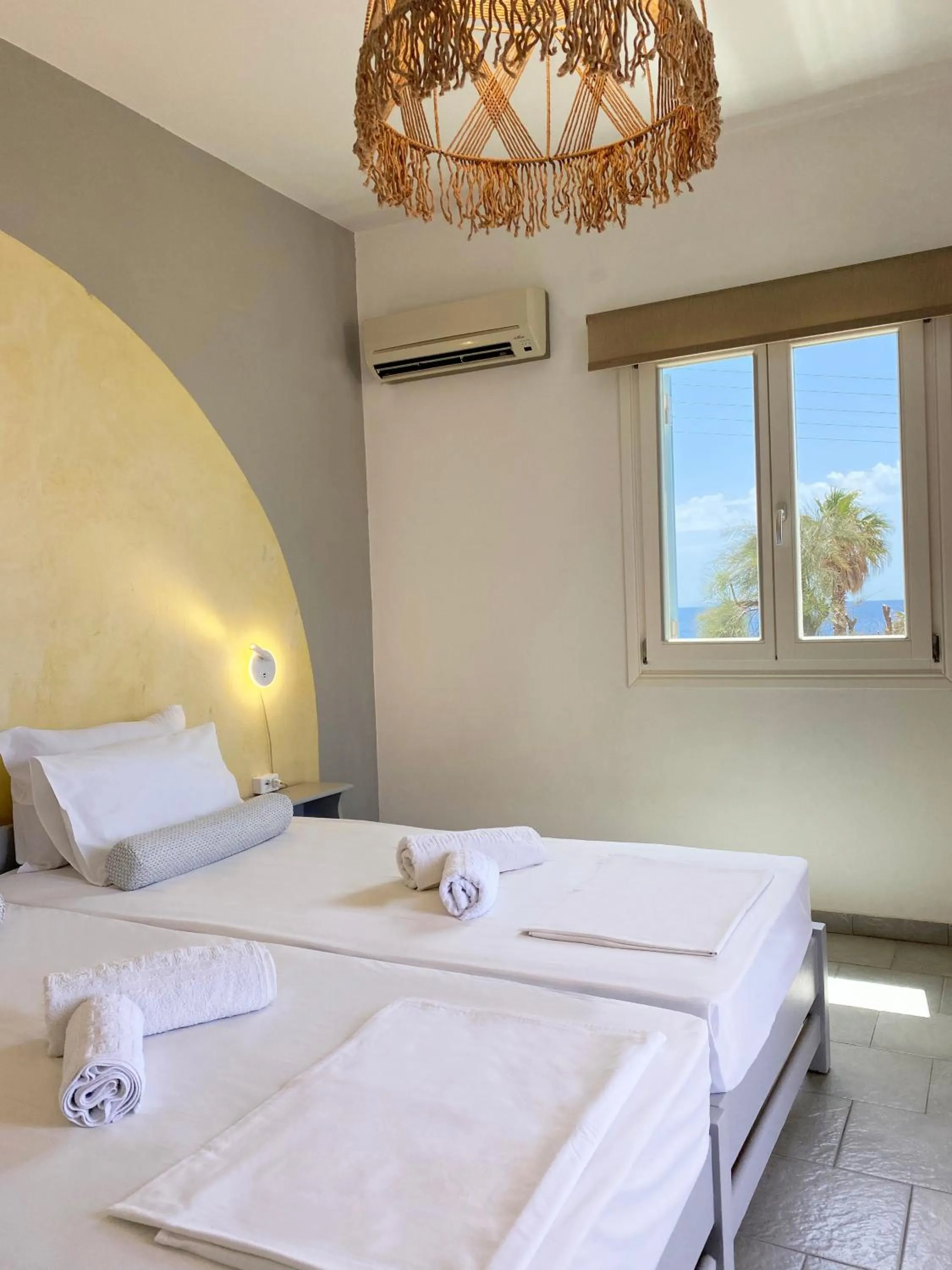 Bedroom, Bed in Agnadi Syros Beachfront Studios & Rooms