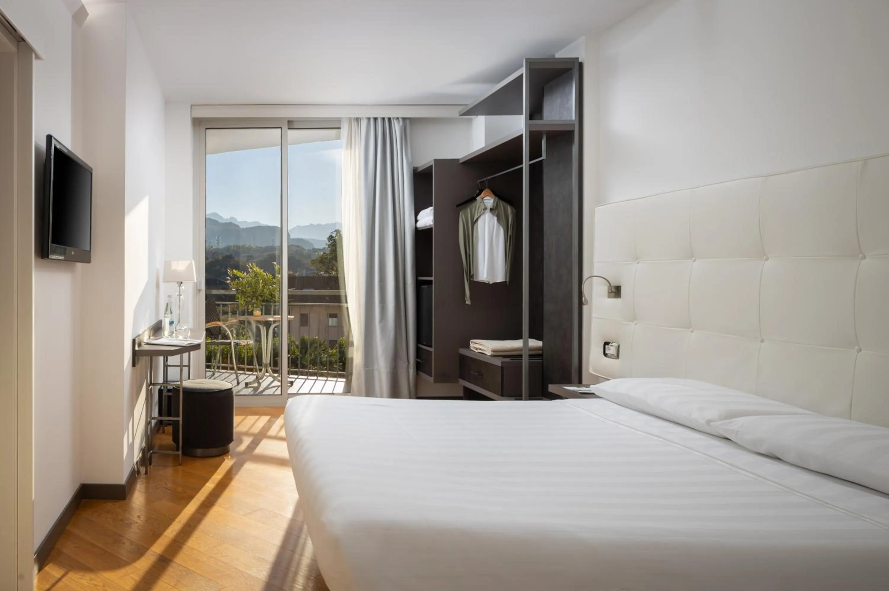 Bedroom, Bed in Hotel Continental - Tonelli Hotels