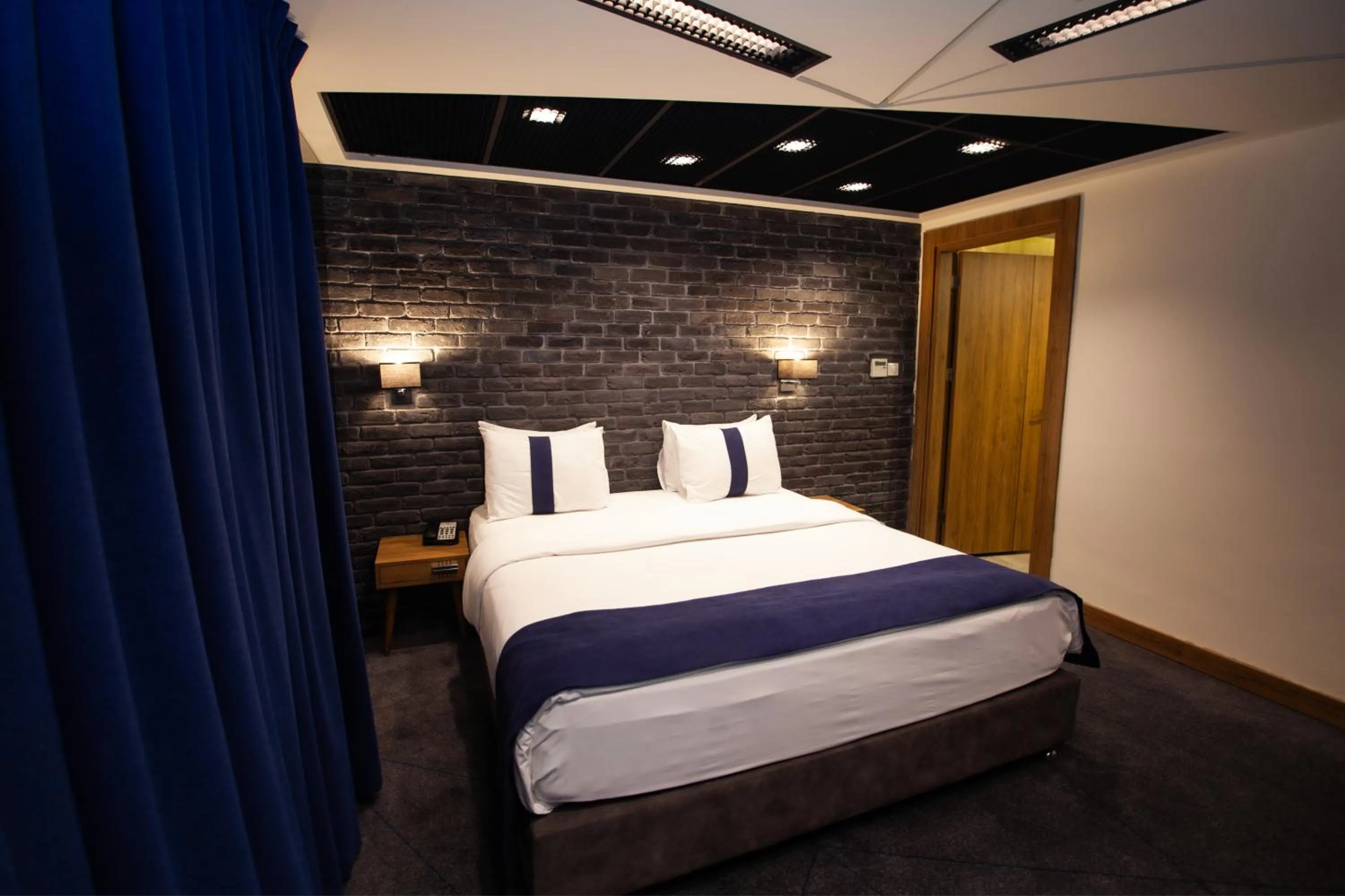 Bed in Monarch Hotel Amman