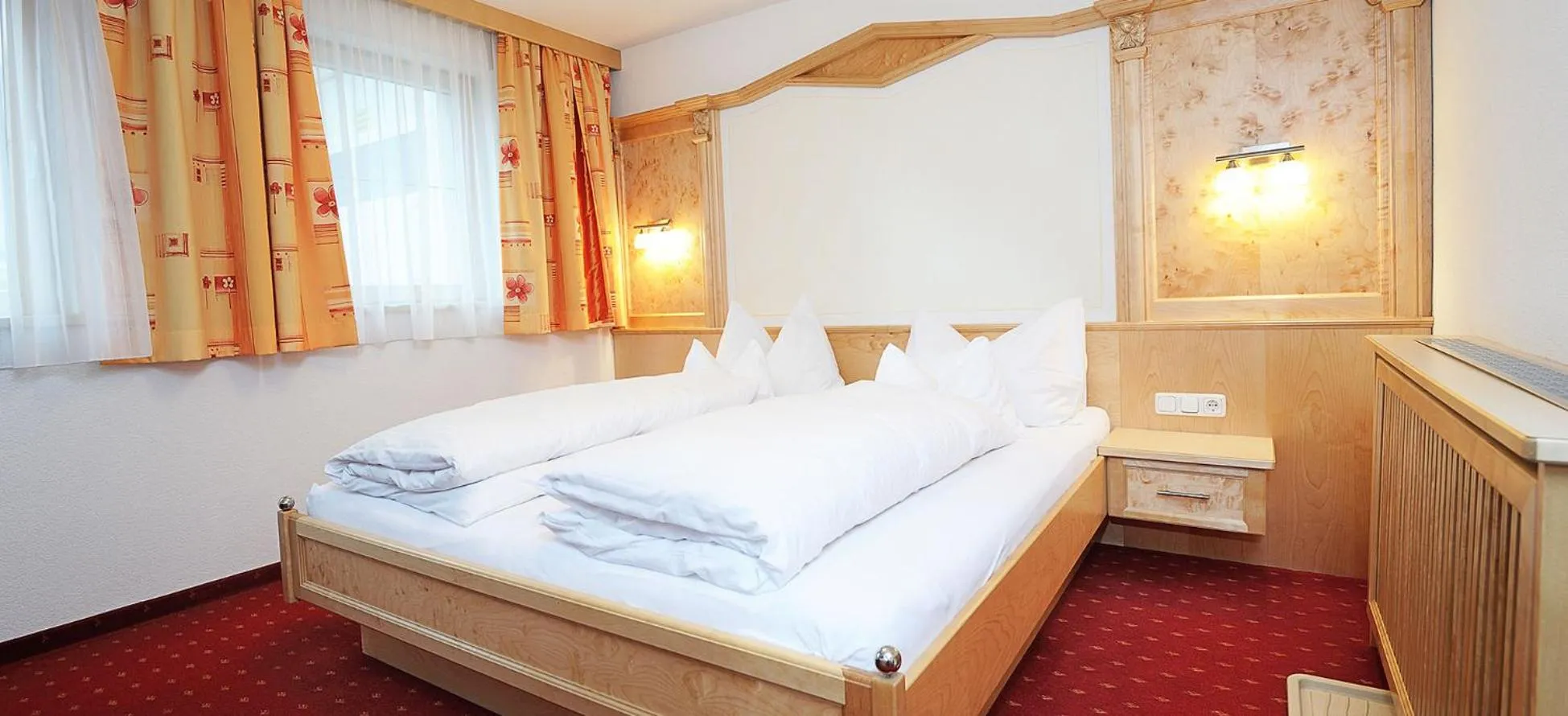 Bed in Hotel Kristall B&B