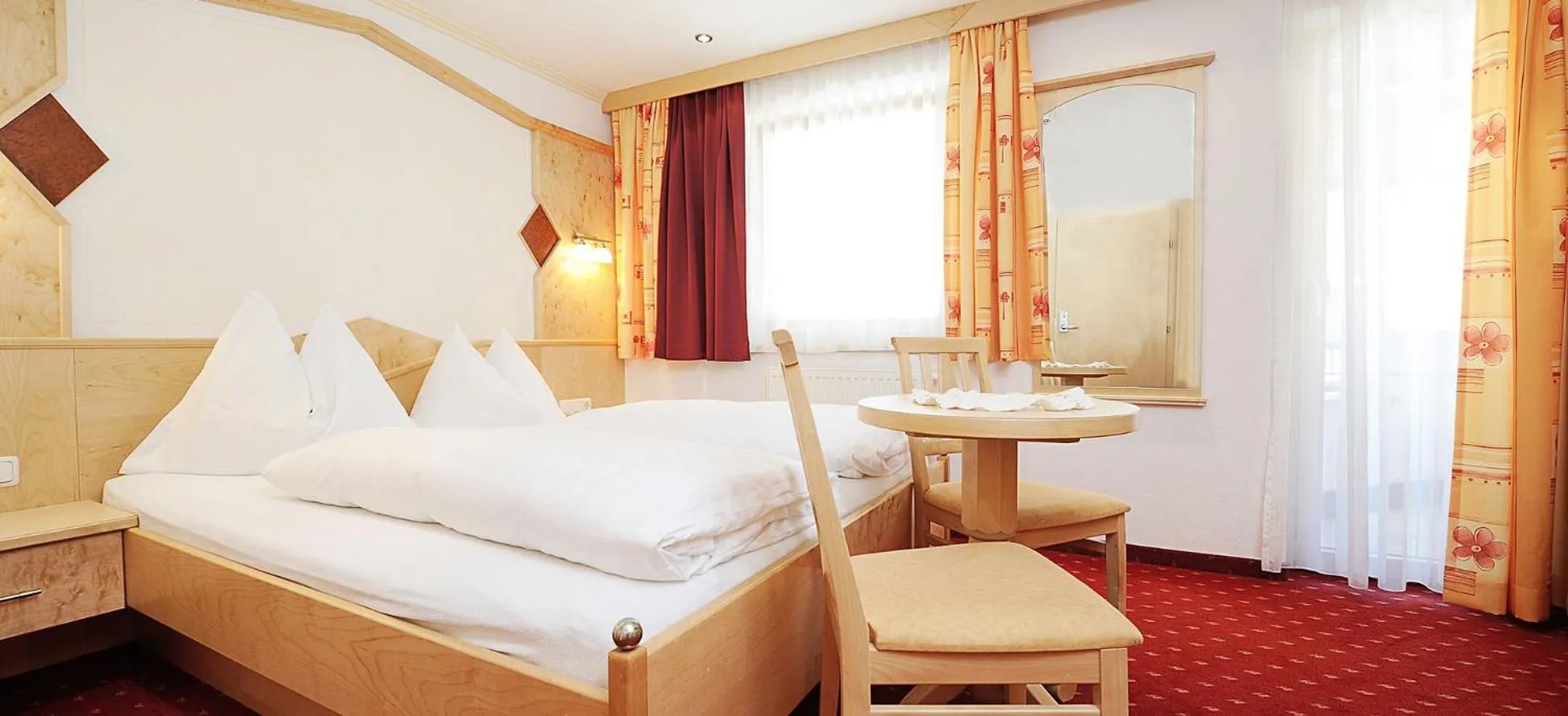 Bed in Hotel Kristall B&B