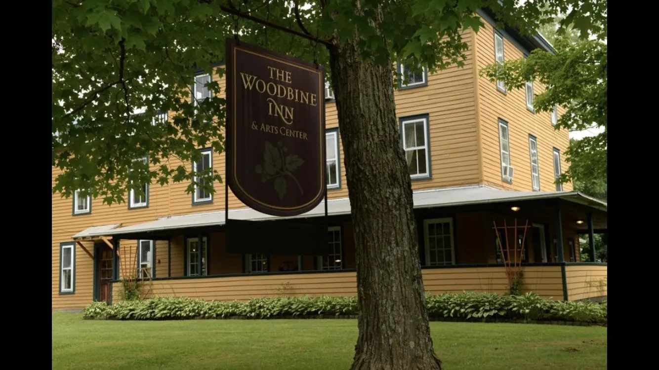 Property logo or sign in The Woodbine Inn