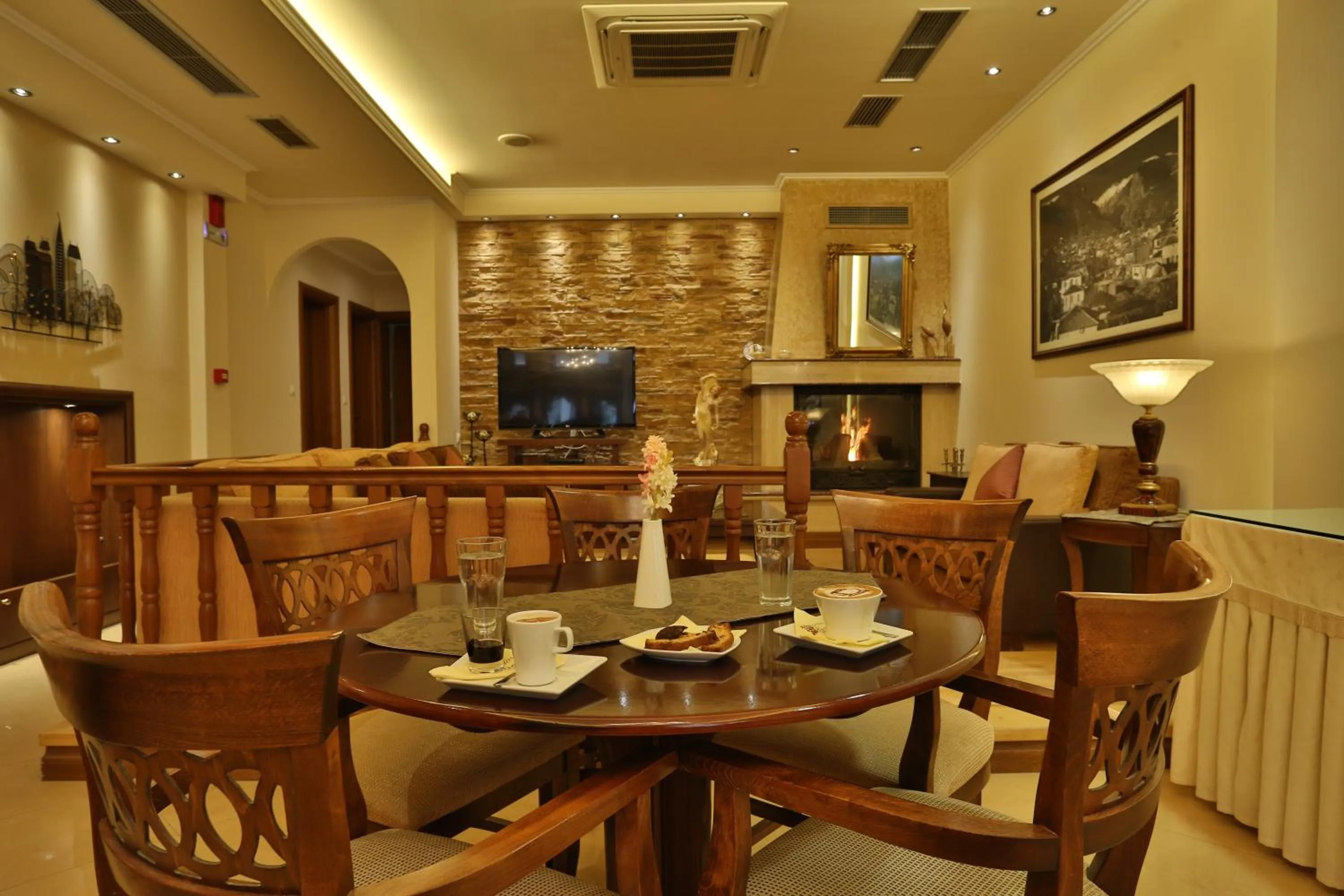 Communal lounge/ TV room in Xenios Dias Boutique Hotel