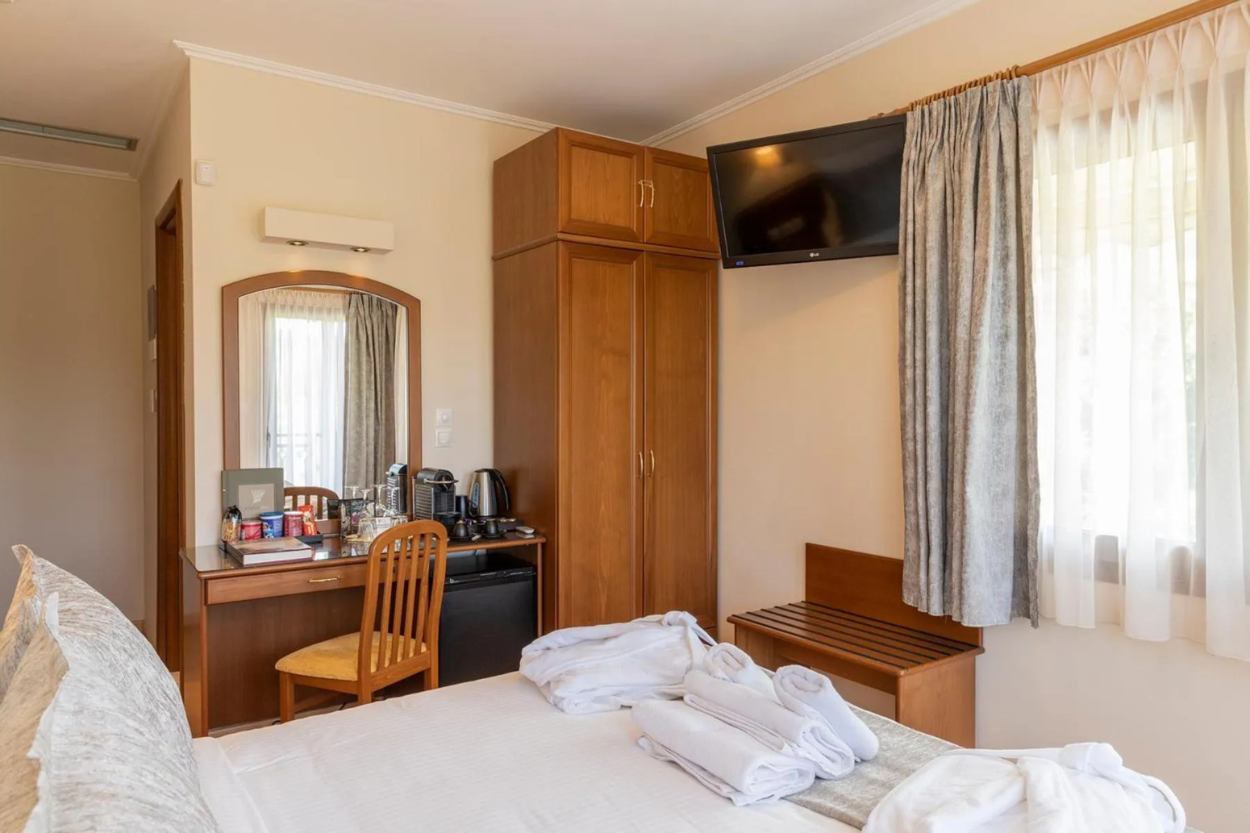 Bed in Xenios Dias Boutique Hotel