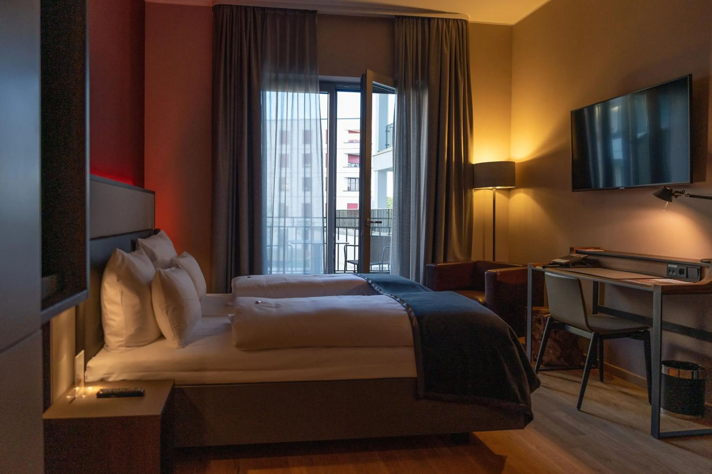 Photo of the whole room, Bed in Qube Hotel Bahnstadt