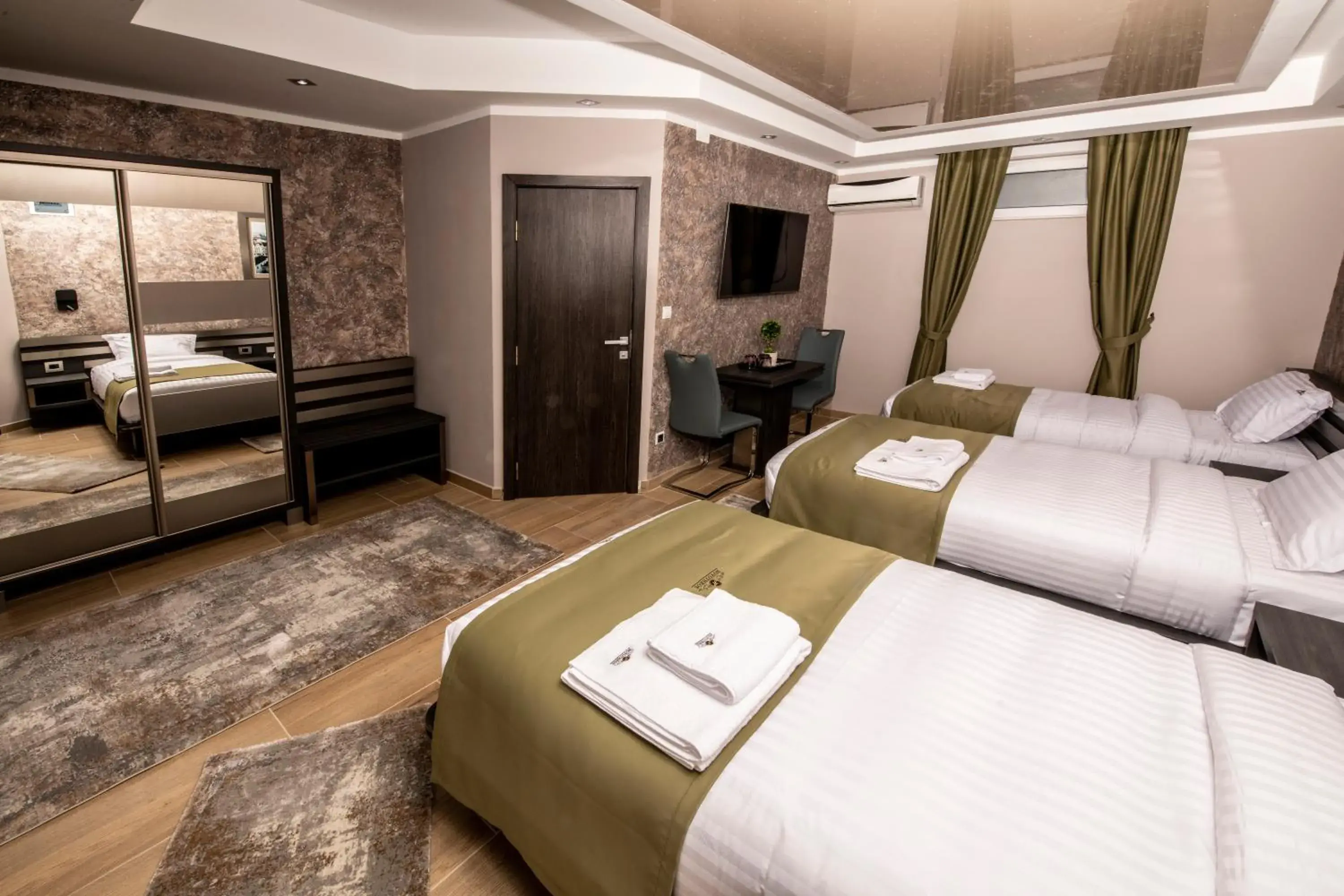 Triple Room in Hotel Novotheos Triple Room in Hotel Novotheos