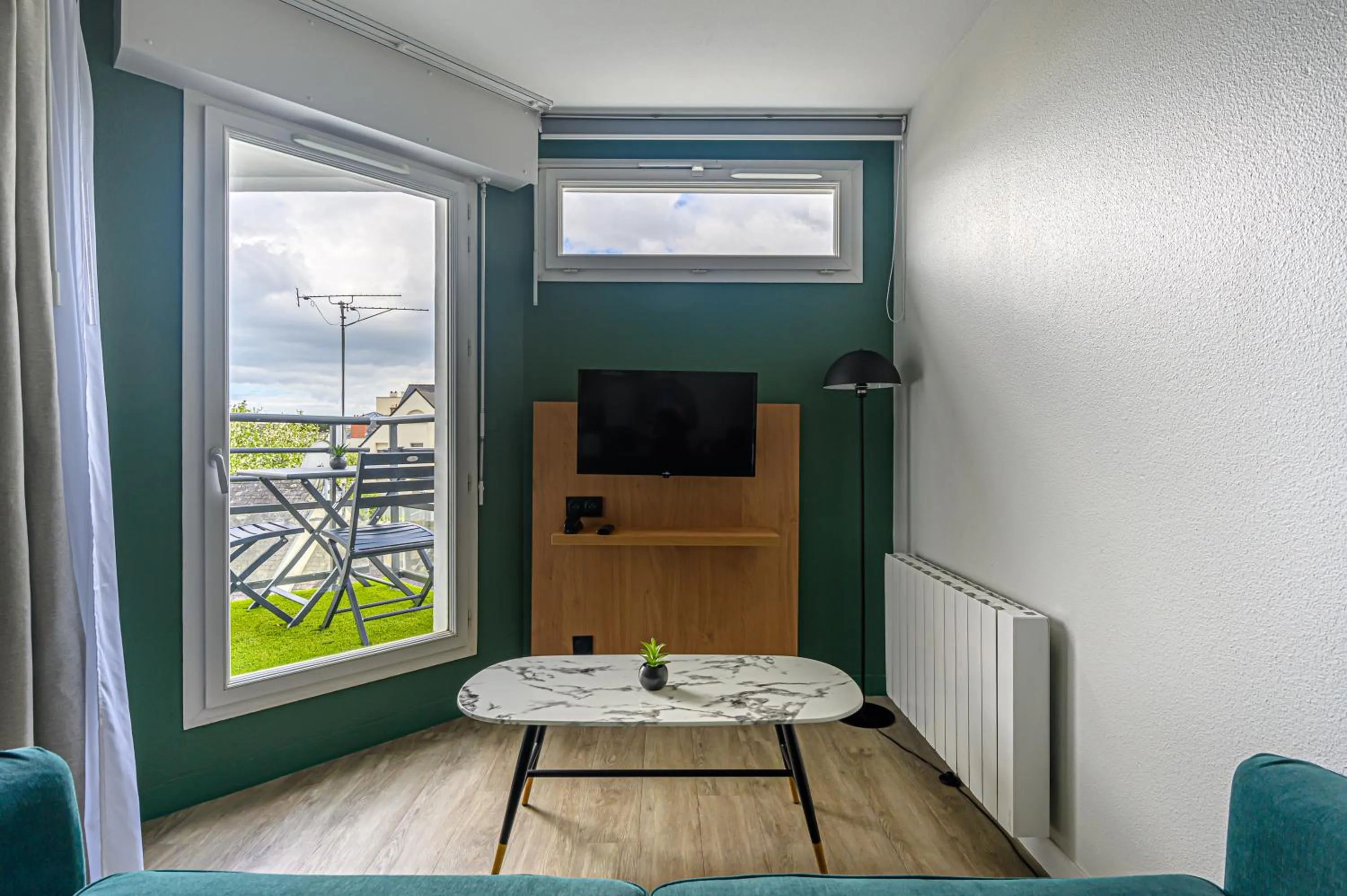 Living room in Appart Hôtel Le Liberté Vannes Centre-Ville