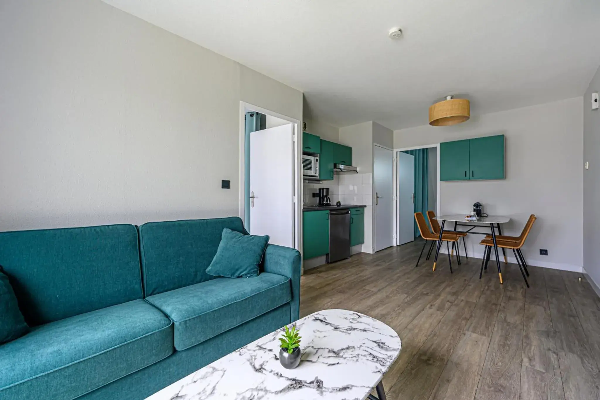 Living room in Appart Hôtel Le Liberté Vannes Centre-Ville Living room in Appart Hôtel Le Liberté Vannes Centre-Ville