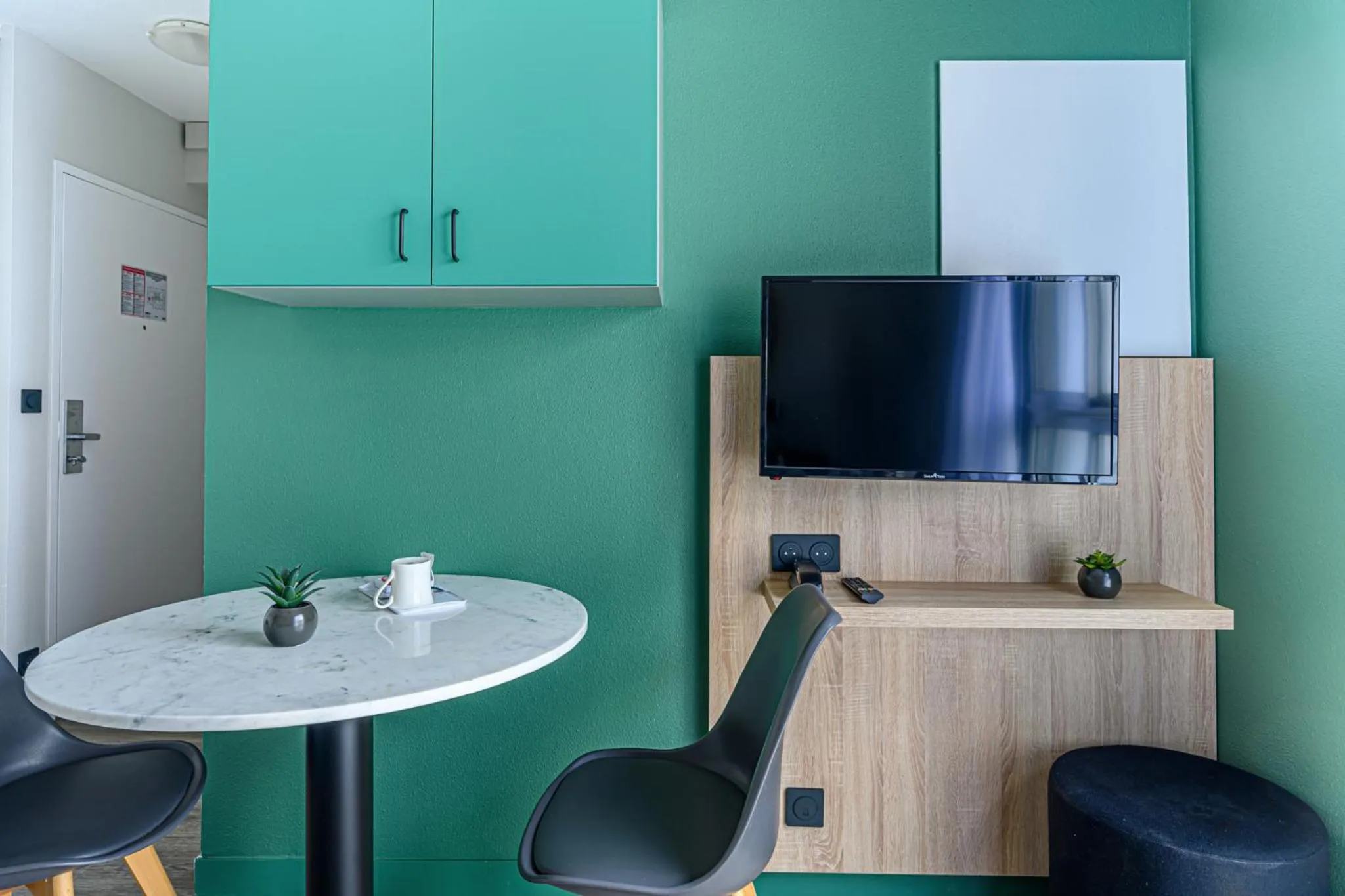 Living room in Appart Hôtel Le Liberté Vannes Centre-Ville