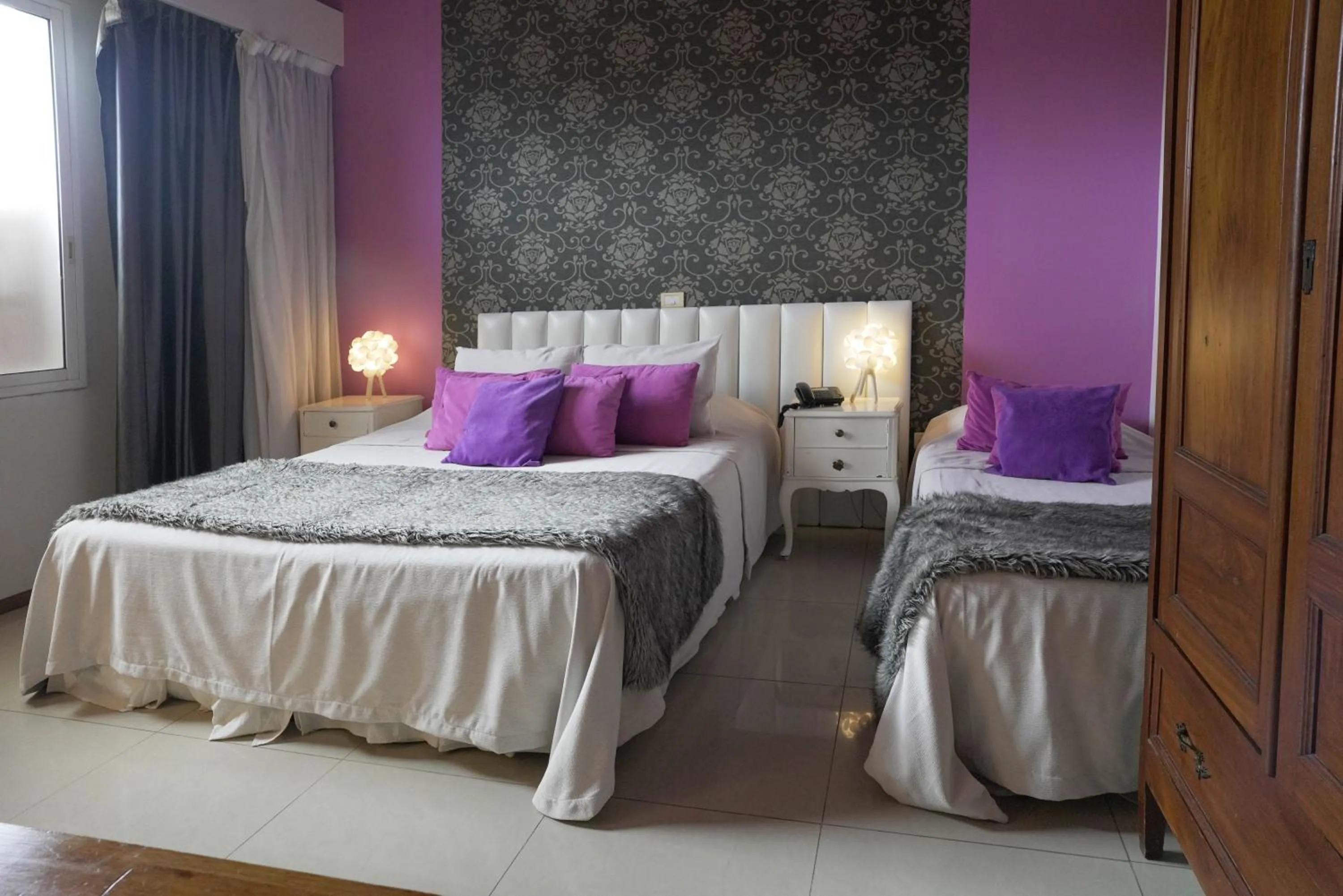 Bed in Los Muelles Boutique Hotel