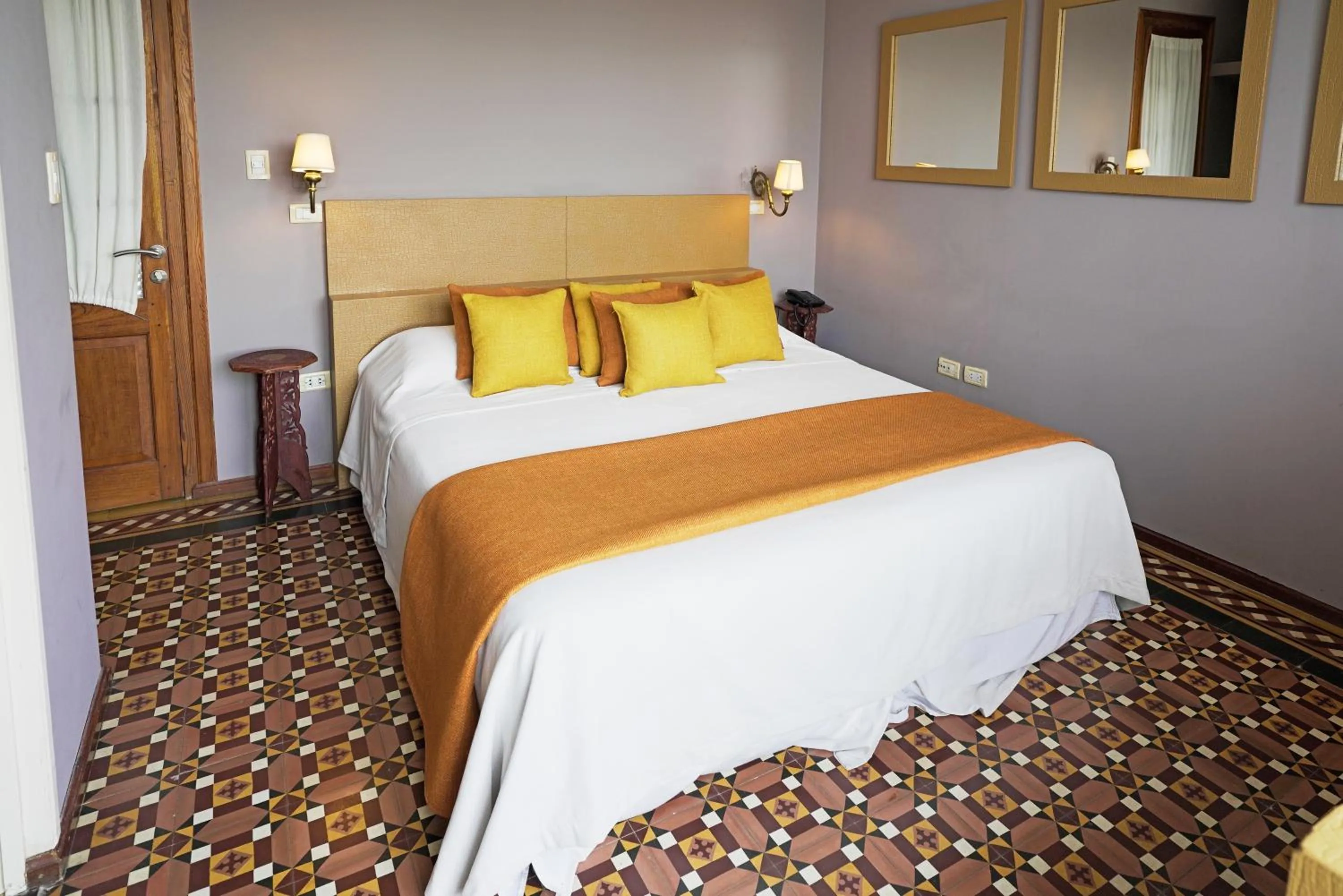 Bed in Los Muelles Boutique Hotel