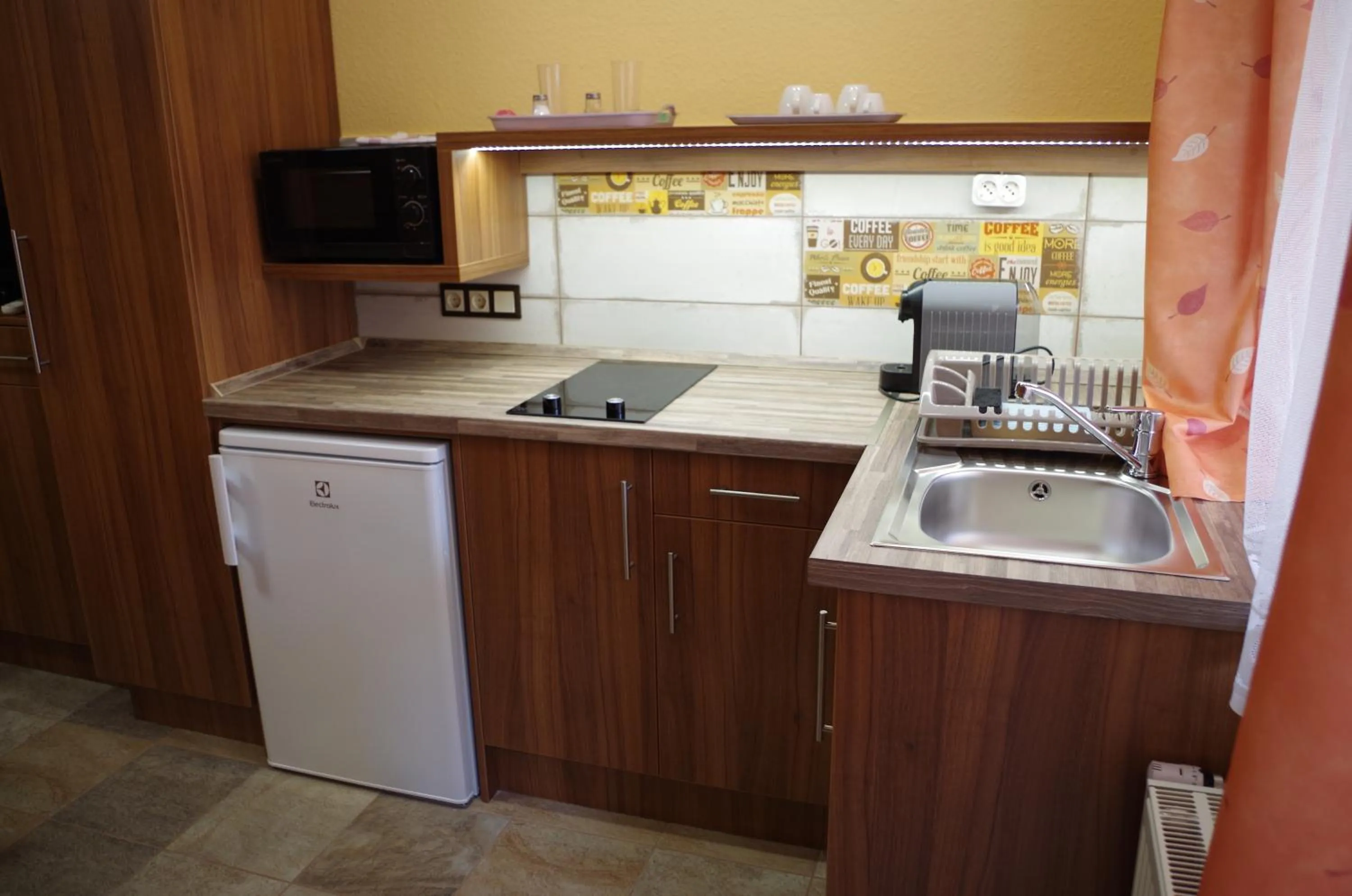 Kitchen or kitchenette in Aranyhal Apartman