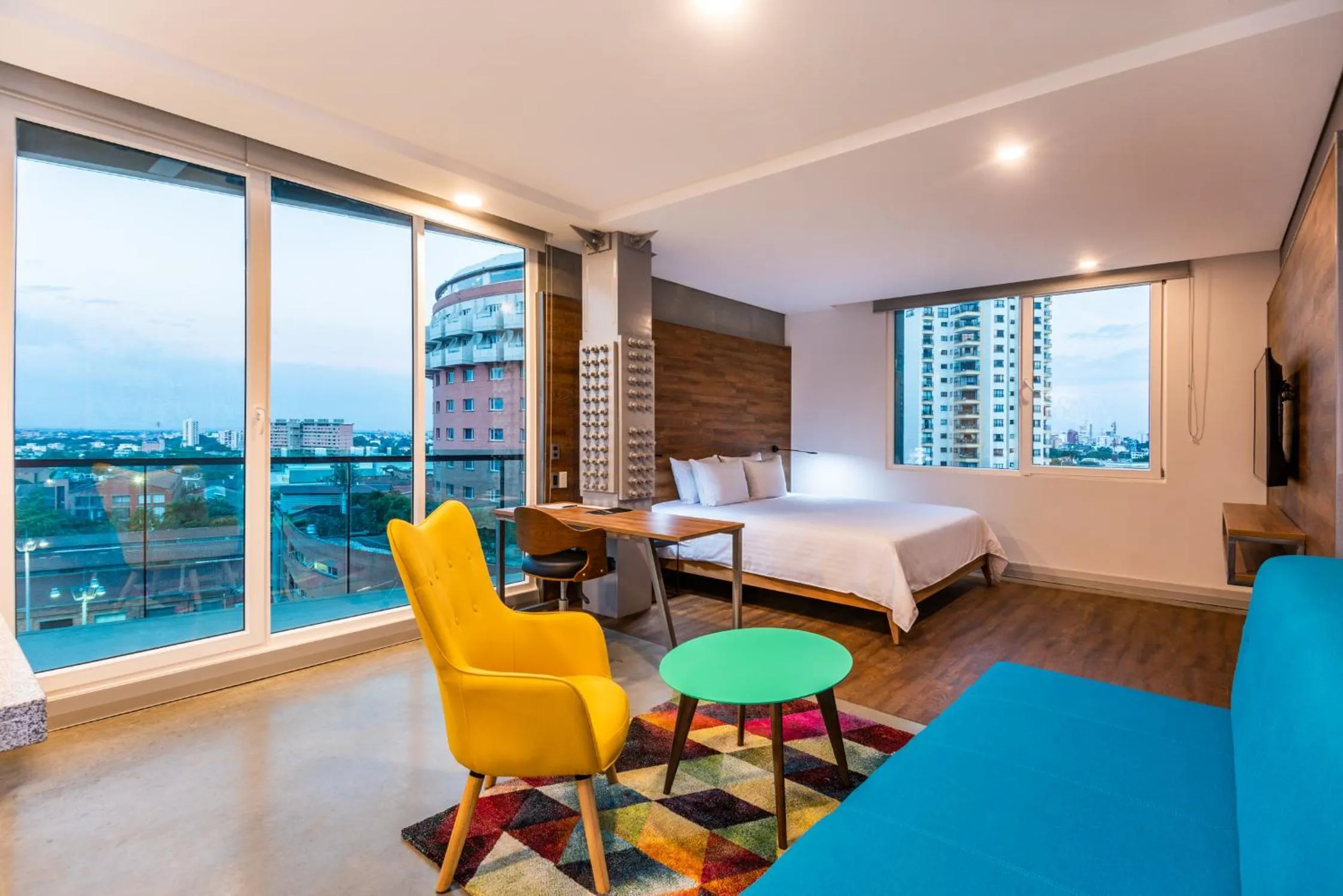 Living room, Bed in Hotel Spirito by Spiwak Chipichape