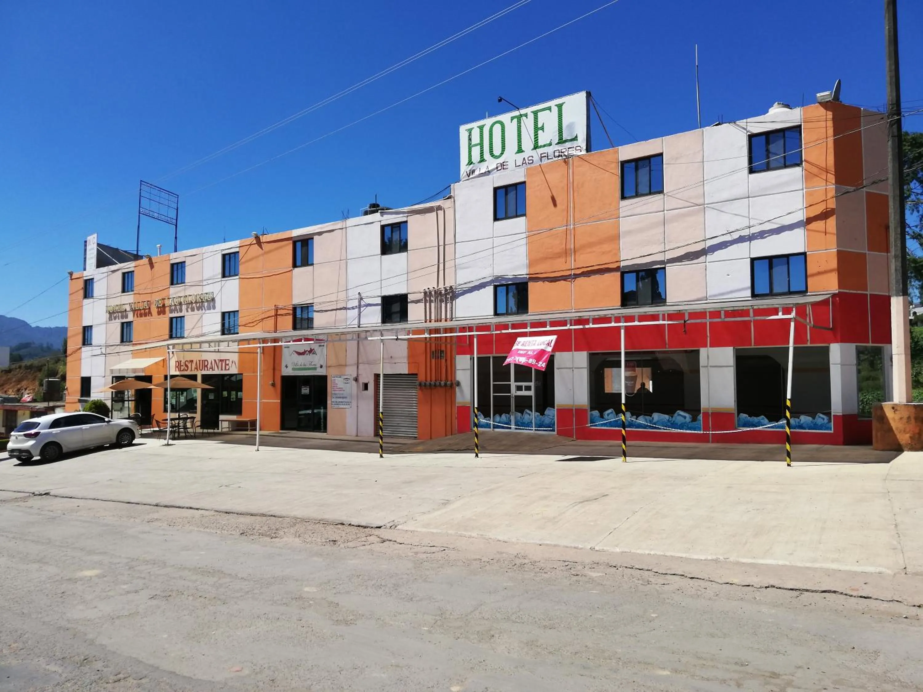 Property building in Hotel Villa De Las Flores