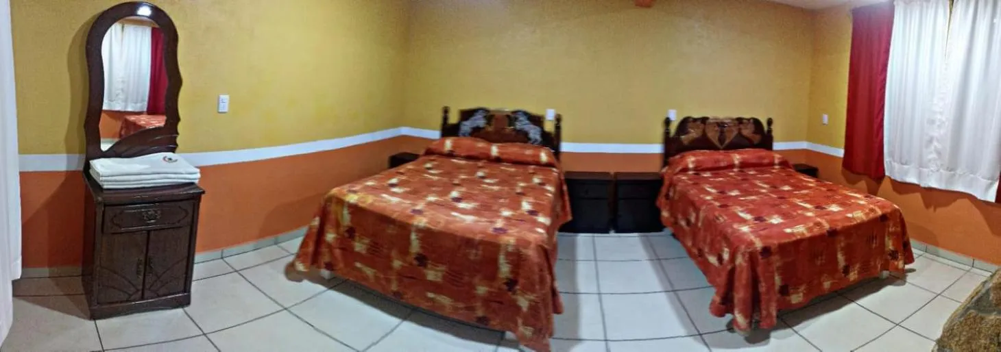 Bedroom in Hotel Villa De Las Flores