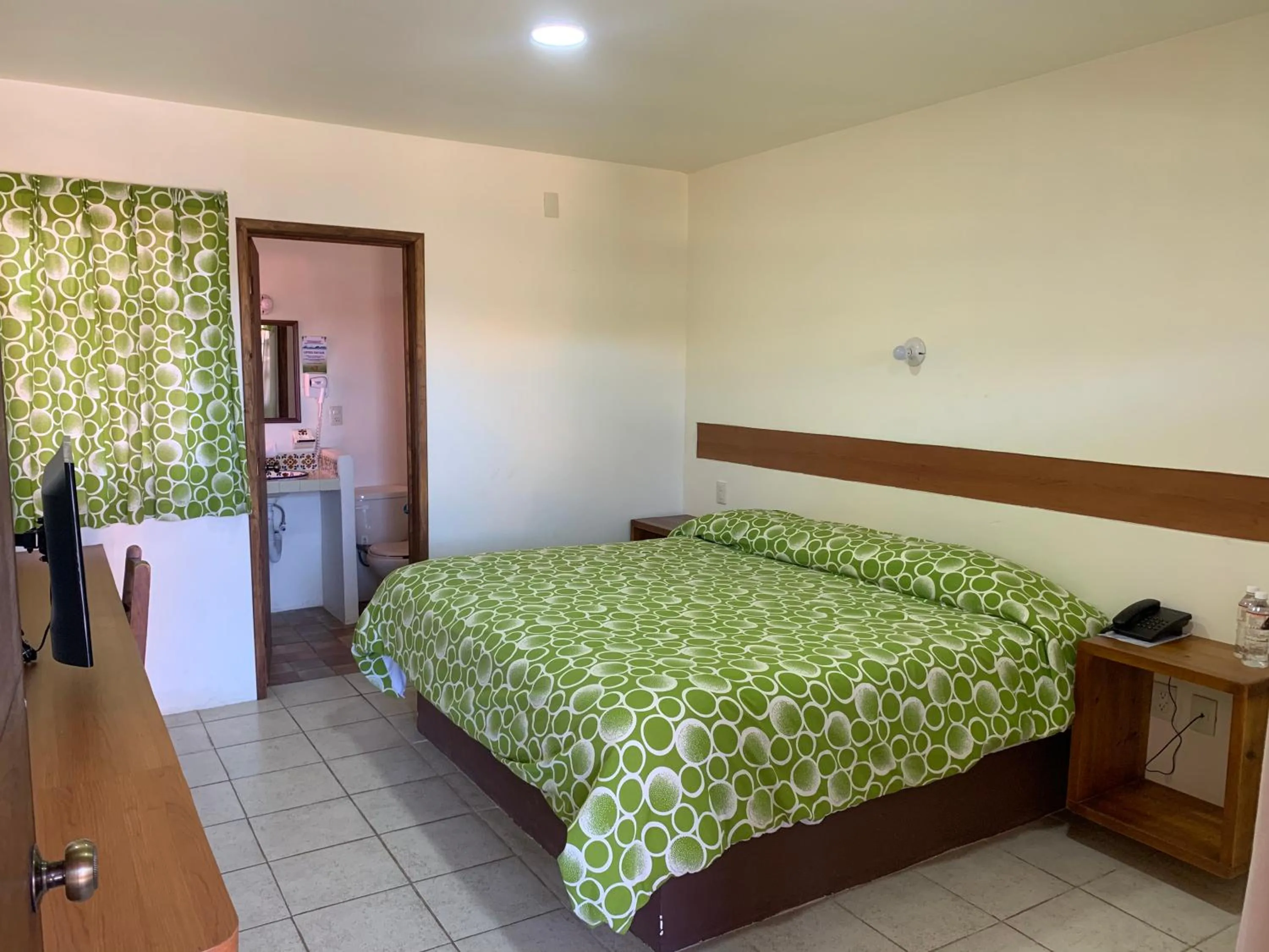 Bed in Hotel Posada Don Ramon