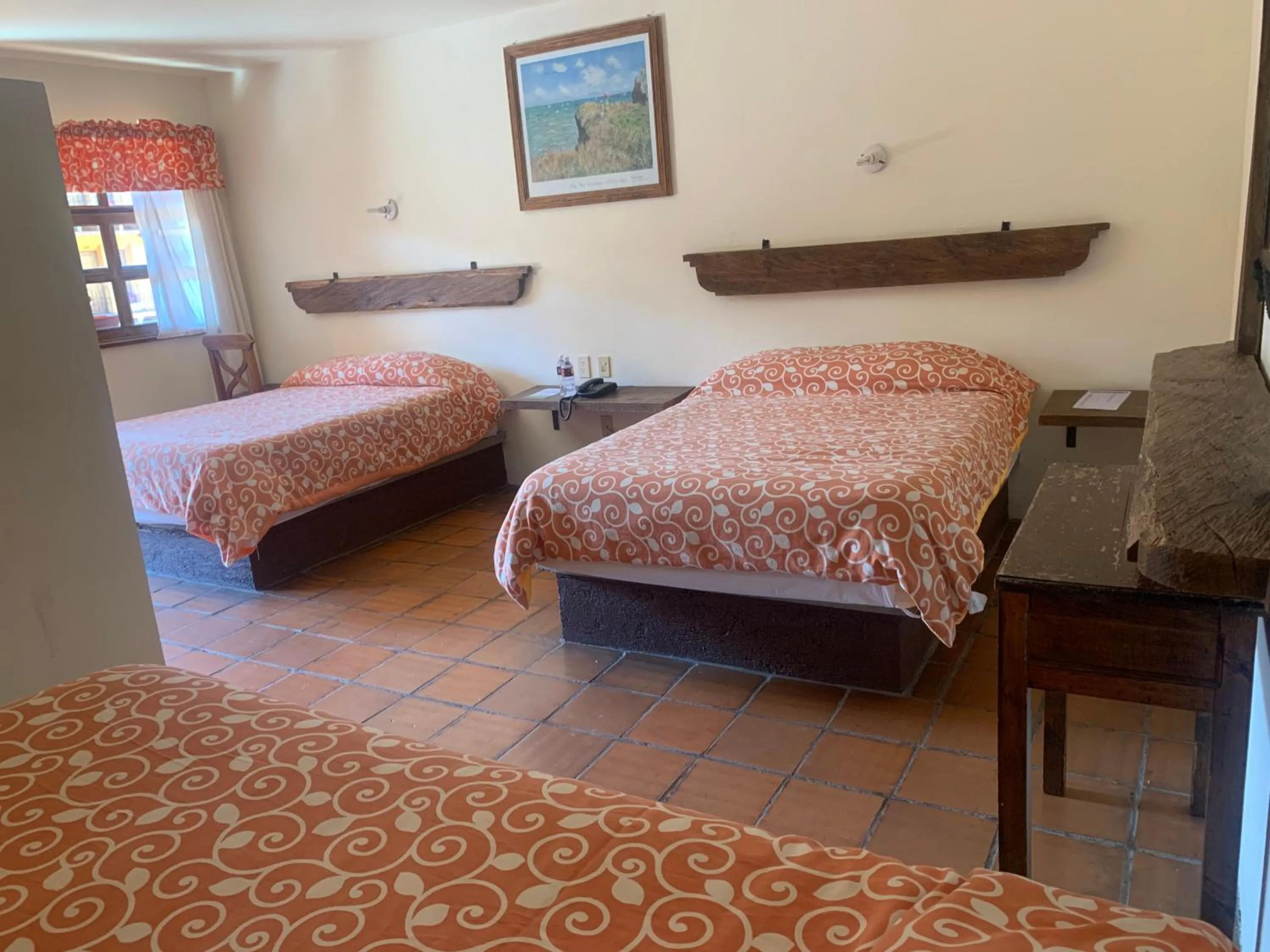 Bed in Hotel Posada Don Ramon